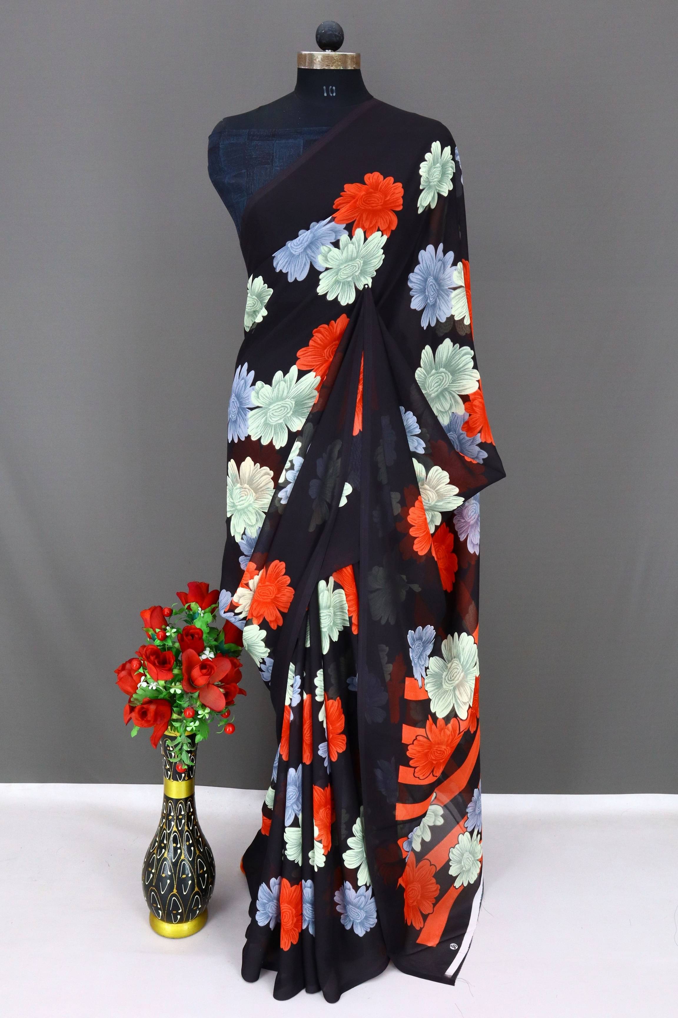 Rekha Maniyar Georgette Printed Regular Saree With Unstitched Blouse Piece ( Black ) Rekha Maniyar Georgette Printed Regular Saree With Unstitched Blouse Piece ( Black )