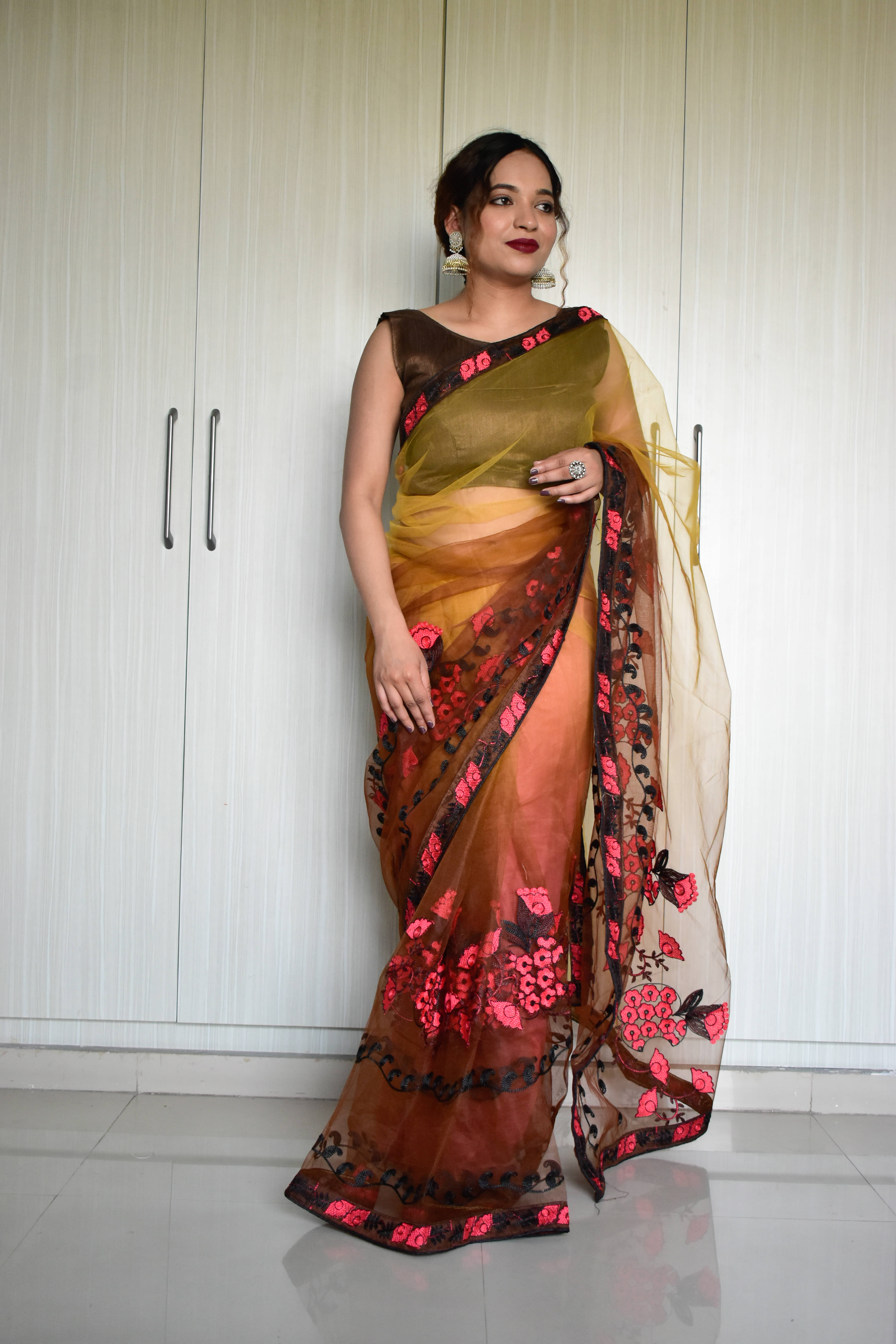     			Nexora Net Printed Bandhani Sarees With Unstitched Blouse Piece ( Coffee )