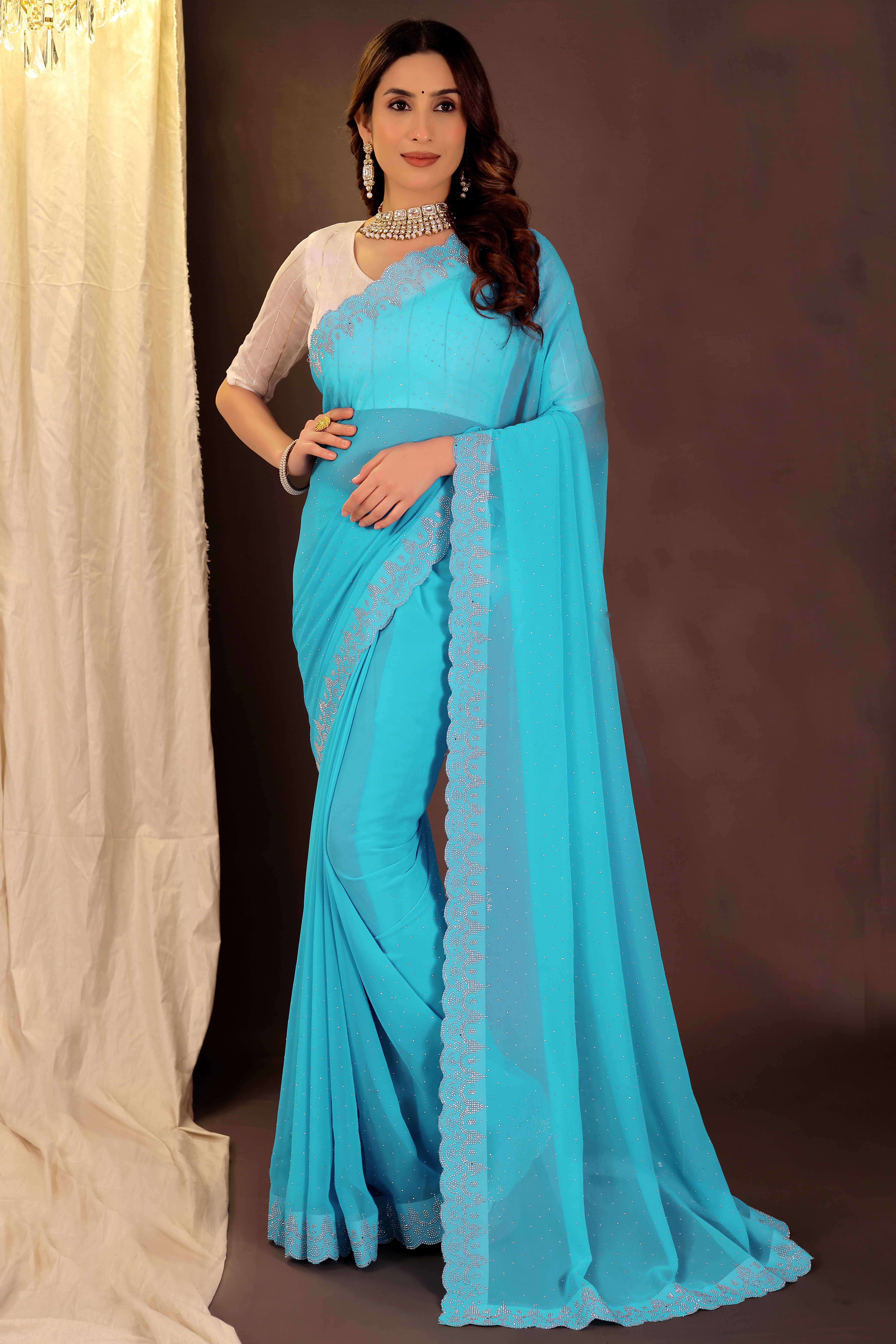 varutex Georgette Embellished Regular Saree With Unstitched Blouse Piece ( Sky Blue ) varutex Georgette Embellished Regular Saree With Unstitched Blouse Piece ( Sky Blue )