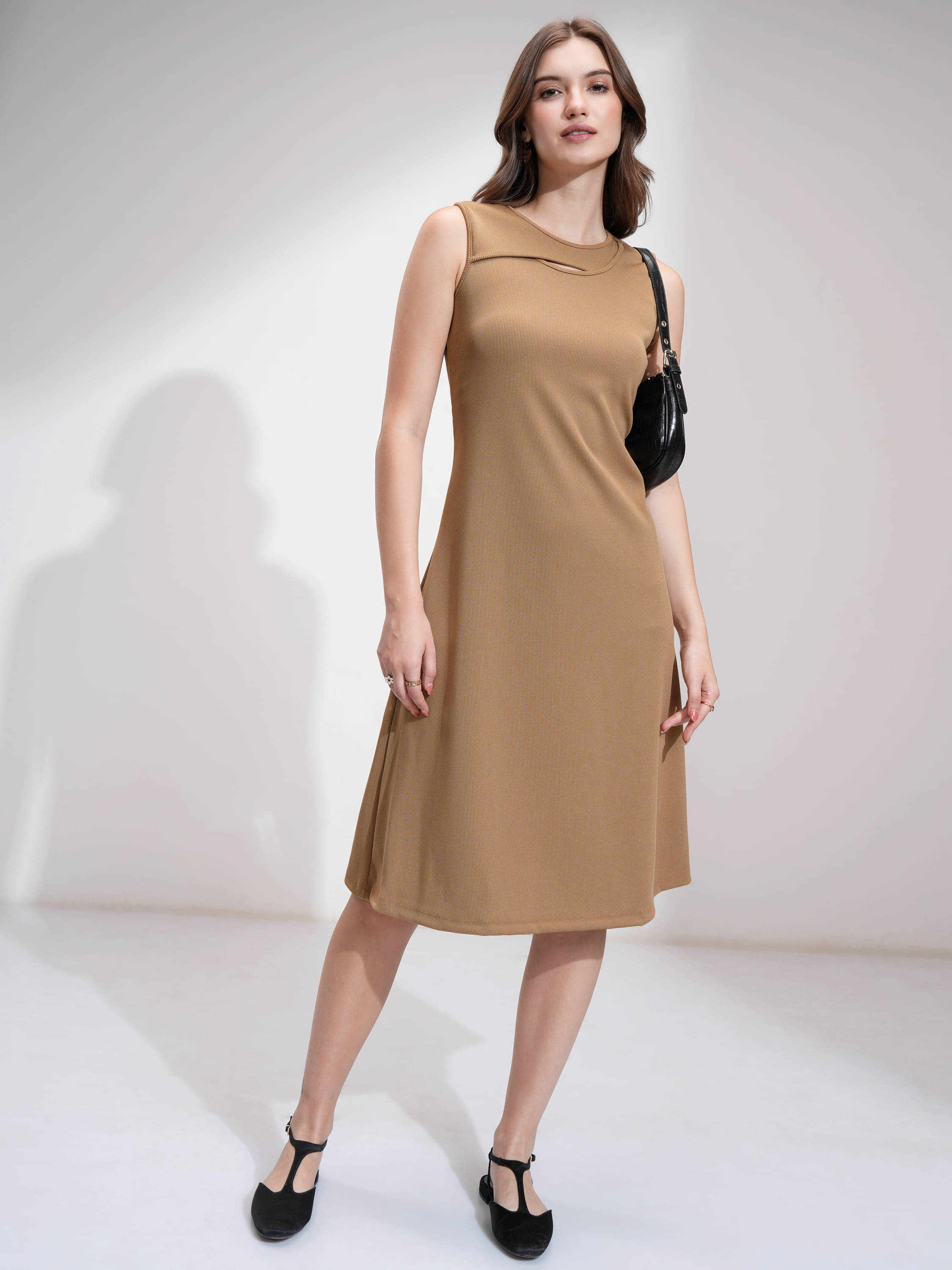     			Tokyo Talkies Women Cotton Blend Solid Fit & Flare Dress ( Beige )