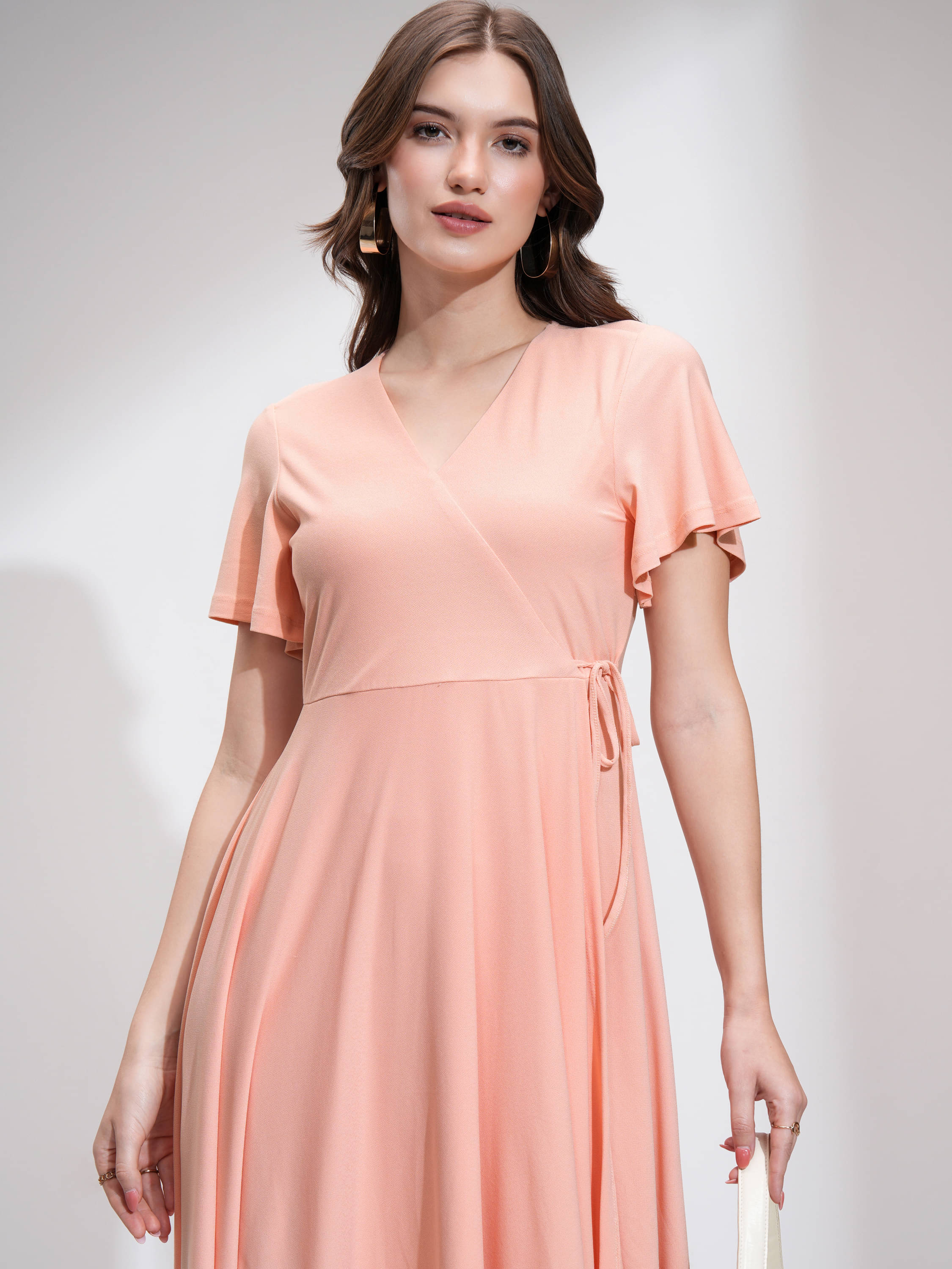 Tokyo Talkies Women Polyester Blend Solid Fit & Flare Dress ( Peach )     			Tokyo Talkies Women Polyester Blend Solid Fit & Flare Dress ( Peach )