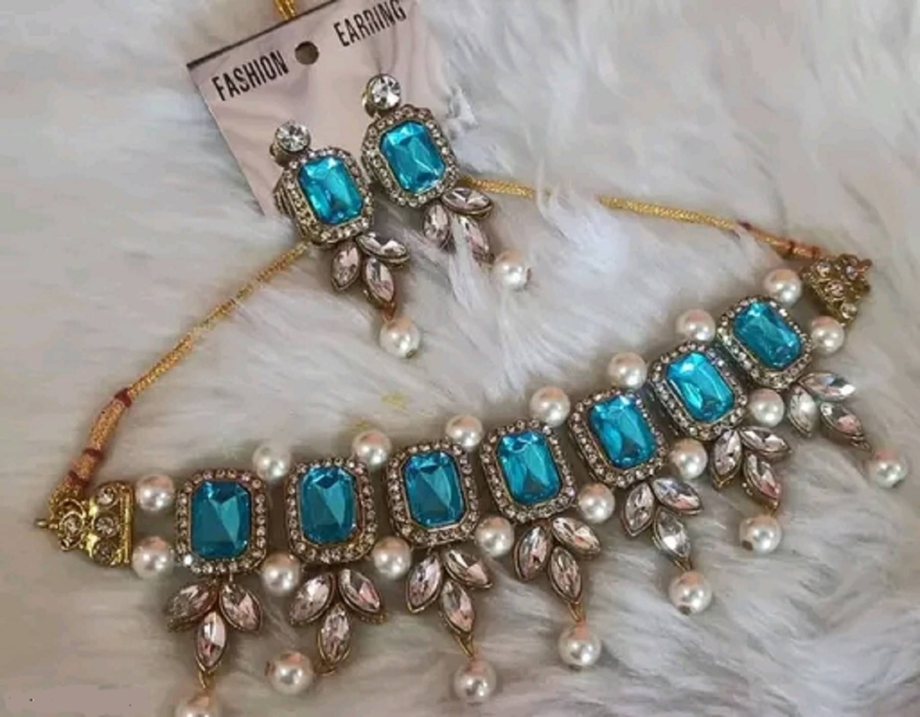     			JEWEL Light Blue Crystal Necklace Set ( Pack of 1 )