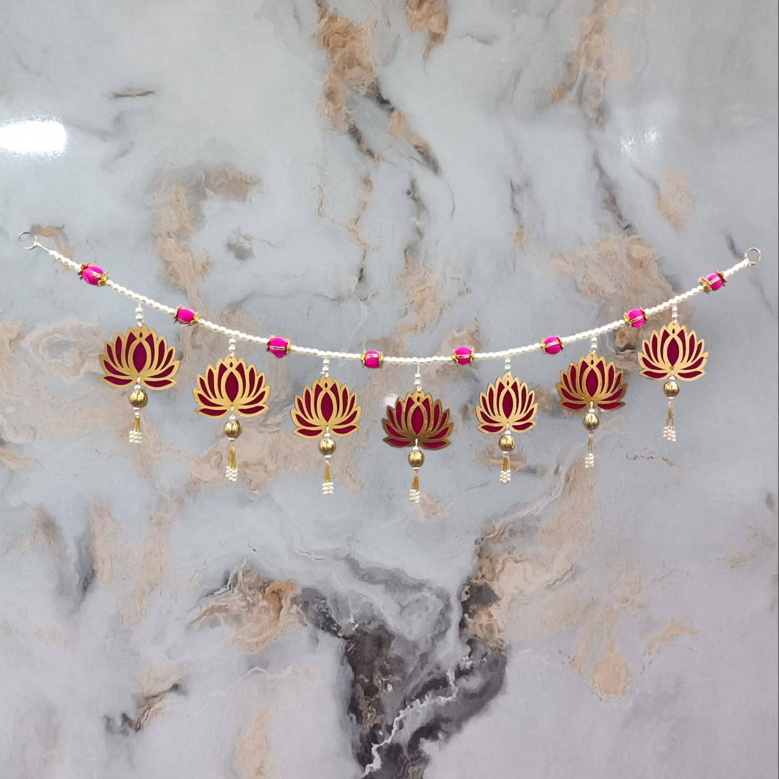 KOOGLY Handcrafted Lotus Toran Banner with Pearl Beads, Pink and Gold Metal Flower Design, Traditional Indian Toran Decoration KOOGLY Handcrafted Lotus Toran Banner with Pearl Beads, Pink and Gold Metal Flower Design, Traditional Indian Toran Decoration