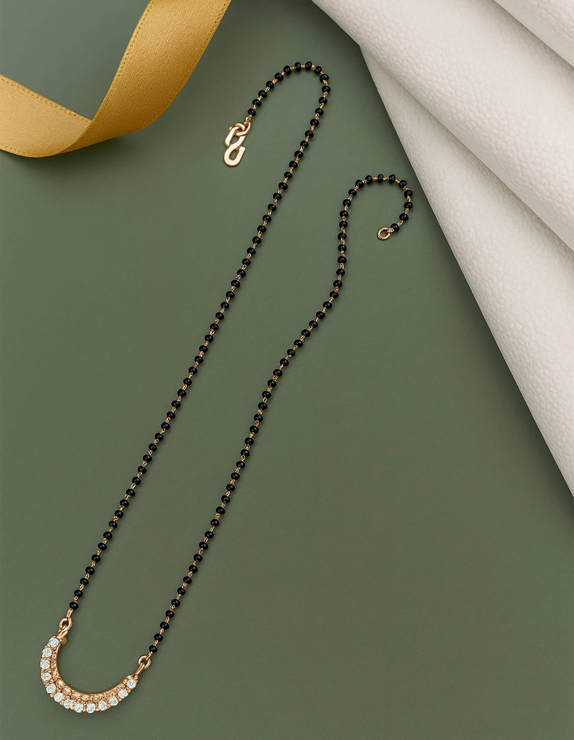     			RANEM Golden Mangalsutra ( Pack of 1 )