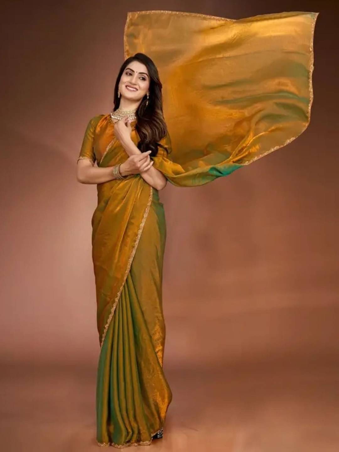 SATVASHIV Chiffon Solid Regular Saree With Unstitched Blouse Piece ( Gold )     			SATVASHIV Chiffon Solid Regular Saree With Unstitched Blouse Piece ( Gold )