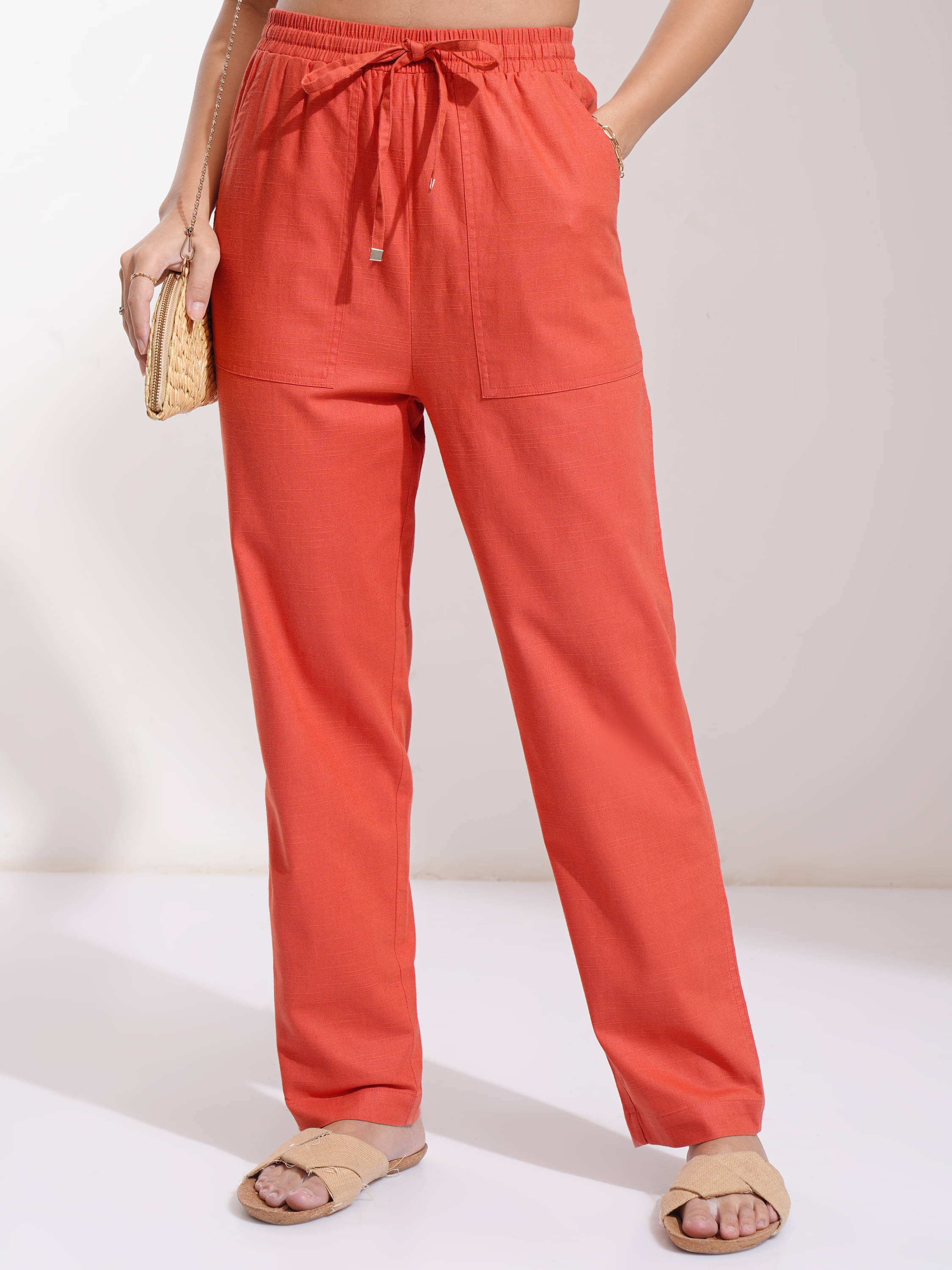     			Tokyo Talkies Women Cotton Blend Casual Trousers ( Rust )