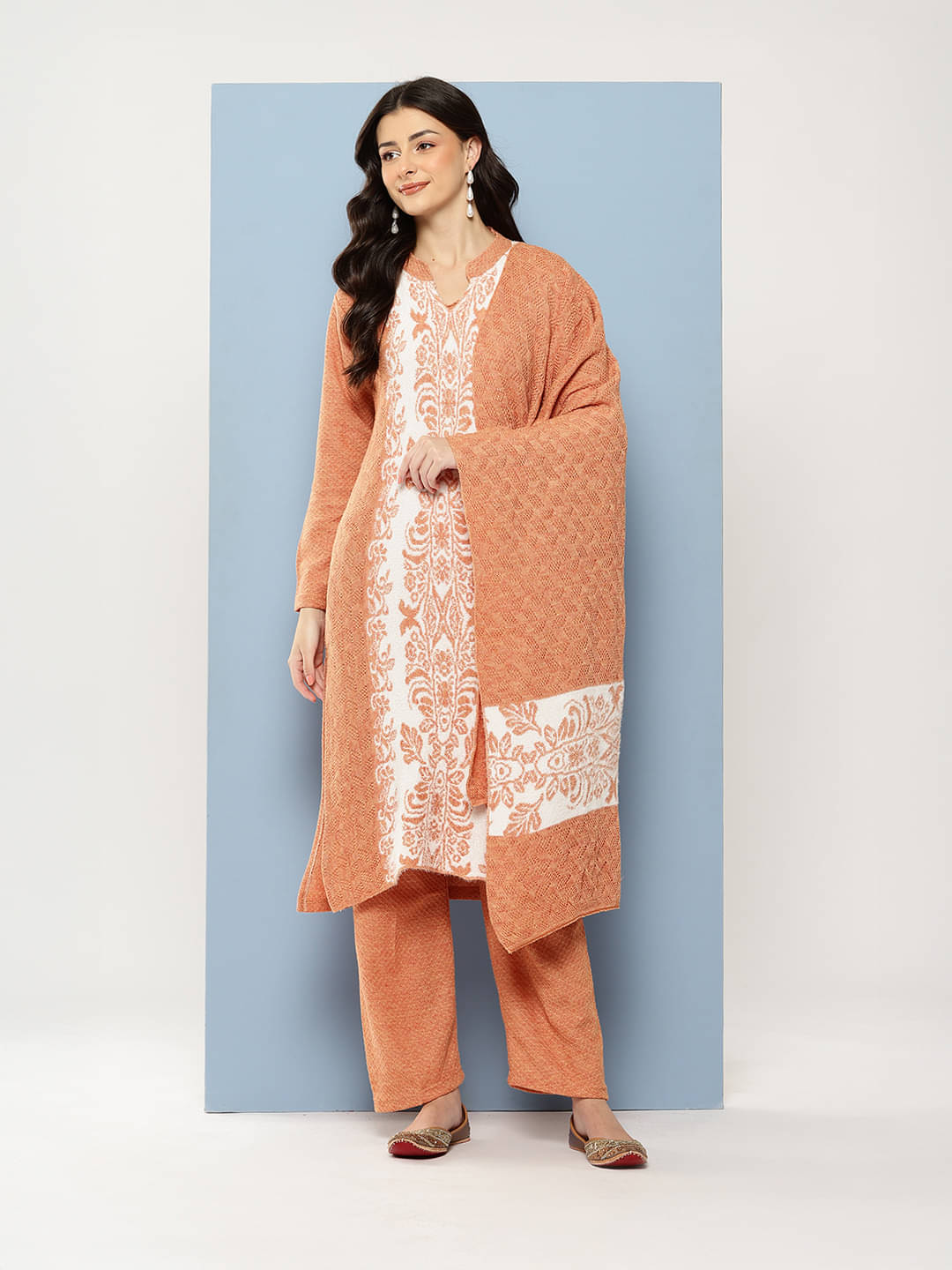     			Aarika Women Woollen Self Design Straight Kurti With Pants ( Peach )