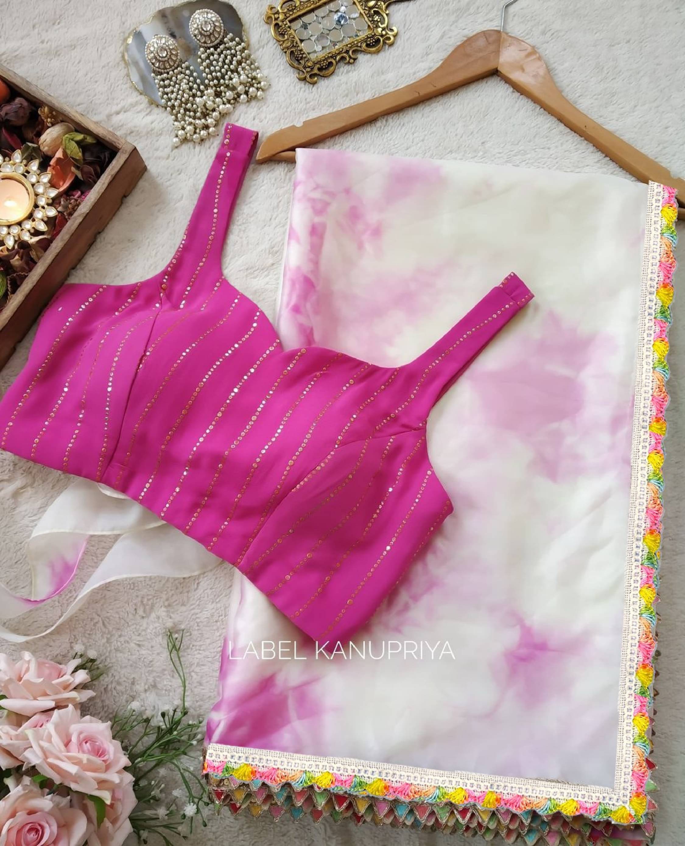KRISHU ETHNICS Organza Printed Regular Saree With Stitched Blouse ( Pink ) KRISHU ETHNICS Organza Printed Regular Saree With Stitched Blouse ( Pink )