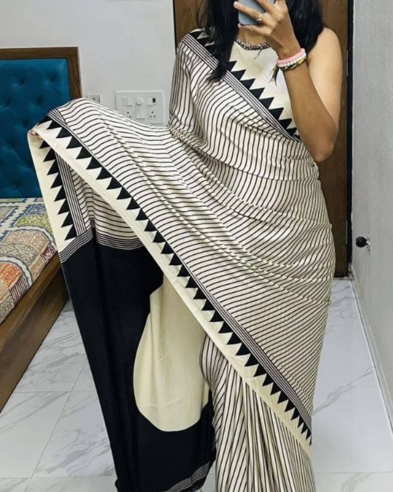 SATVASHIV Satin Striped Regular Saree With Unstitched Blouse Piece ( Black )     			SATVASHIV Satin Striped Regular Saree With Unstitched Blouse Piece ( Black )