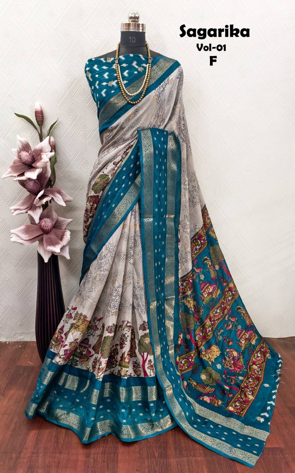     			Sitanjali Viscose Printed Sambalpuri Saree With Unstitched Blouse Piece ( Turquoise )