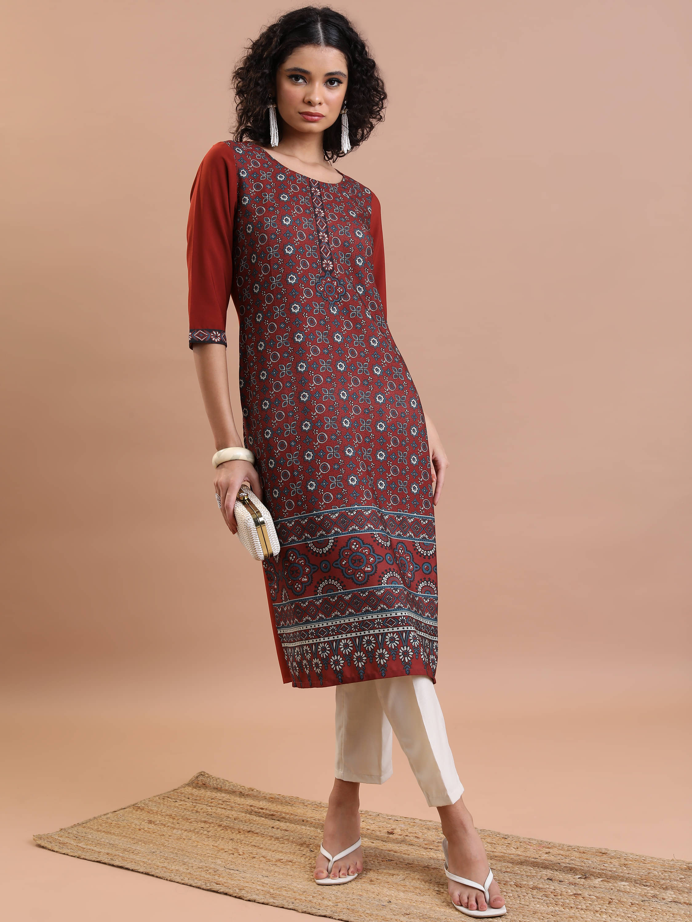     			Vishudh Women Polyester Printed Straight Kurti ( Rust )