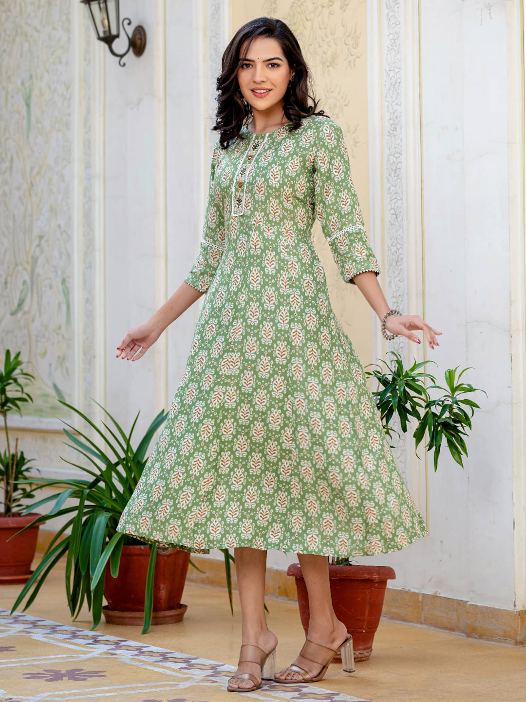 R M CREATION Women Cotton Blend Flared Stitched Ethnic Gown ( Green )     			R M CREATION Women Cotton Blend Flared Stitched Ethnic Gown ( Green )