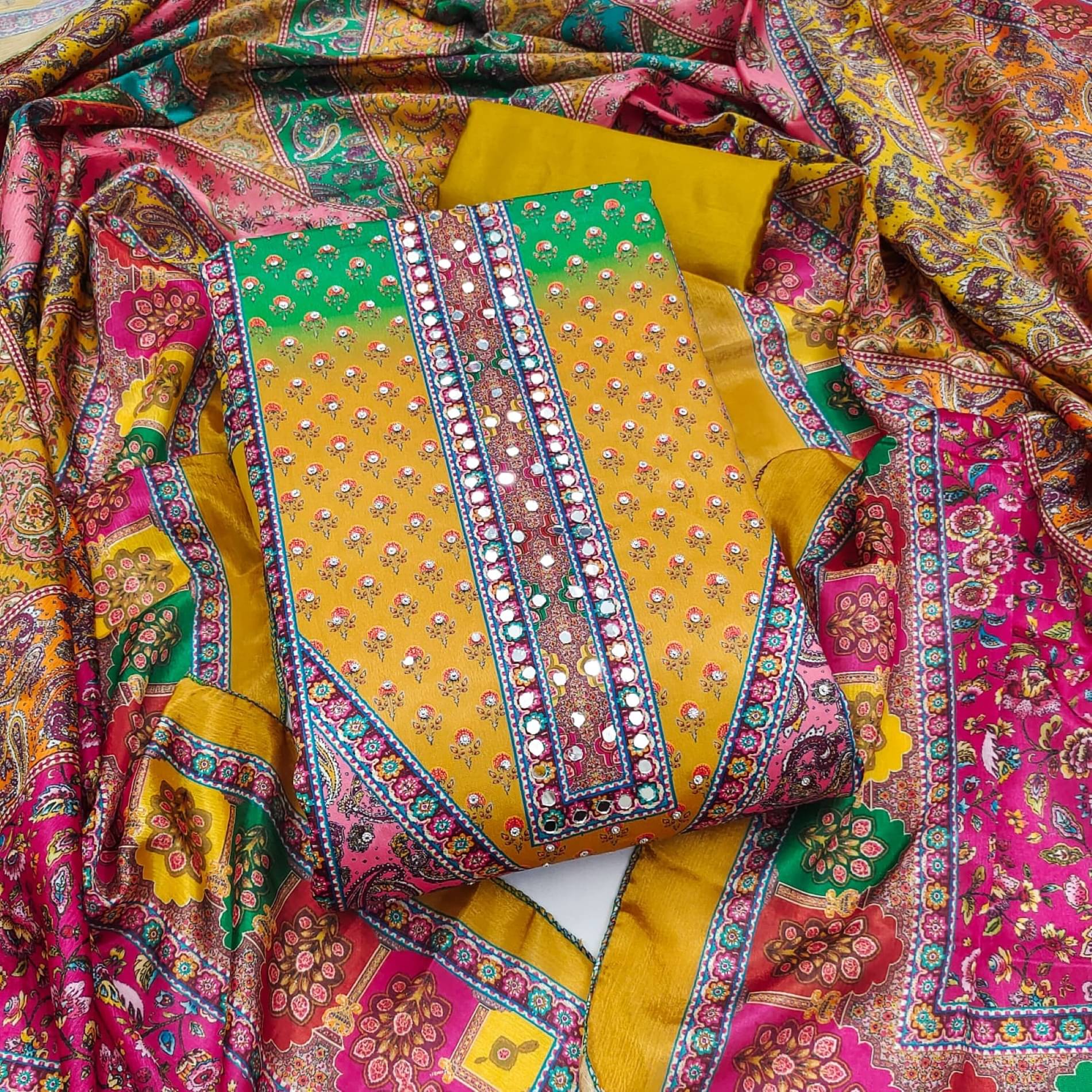     			Rangtulika Ethnics Women Chiffon Unstitched Dress Material ( Yellow )