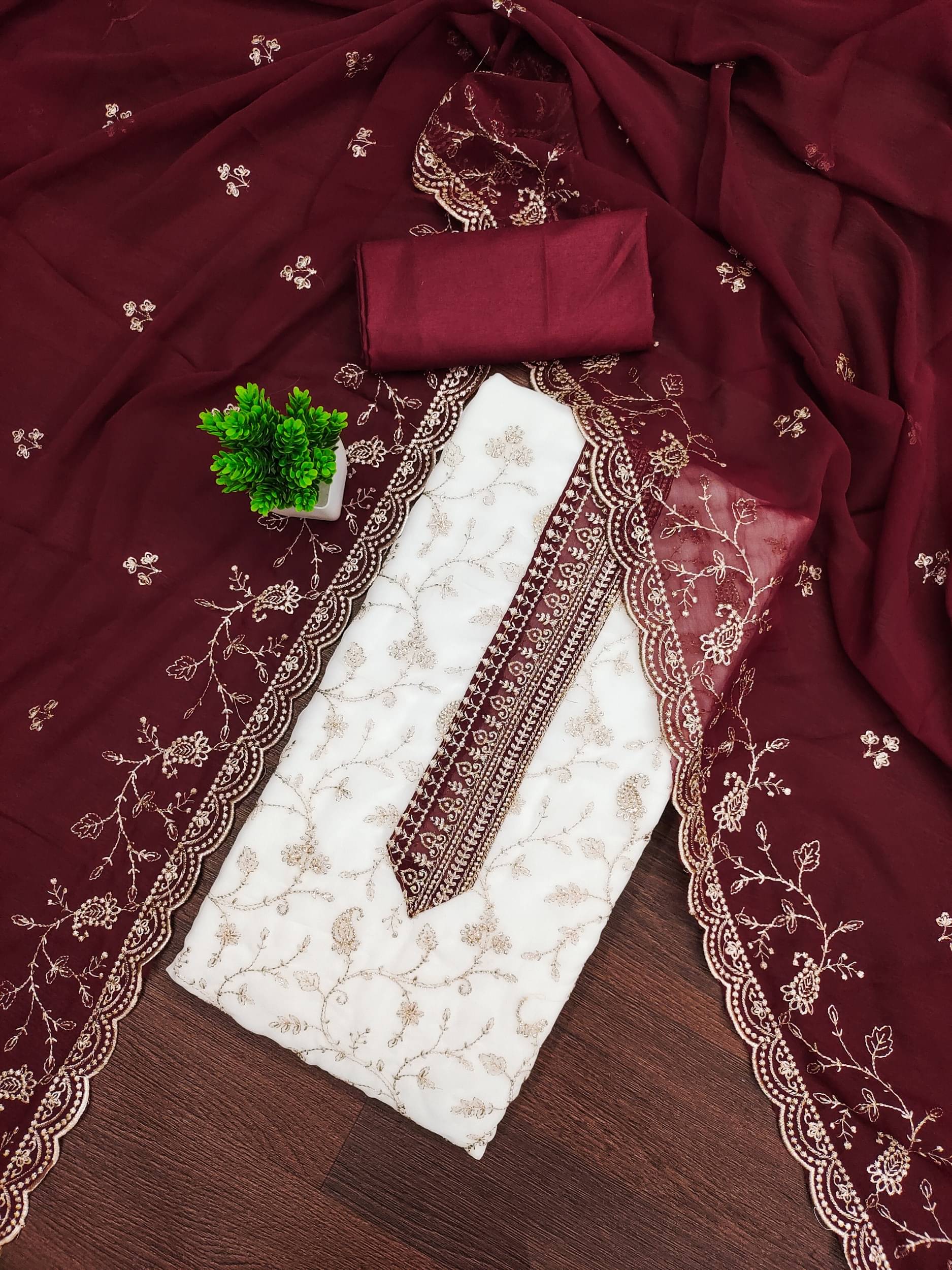     			Rangtulika Ethnics Women Georgette Unstitched Dress Material ( Maroon )