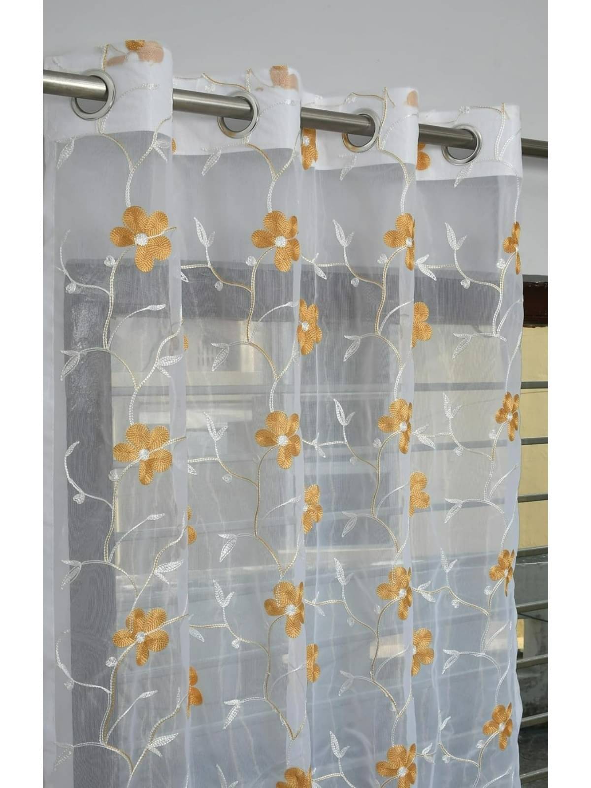 UrbanArts Floral Transparent Eyelet Curtain 5 ft ( Pack of 1 ) - Yellow UrbanArts Floral Transparent Eyelet Curtain 5 ft ( Pack of 1 ) - Yellow