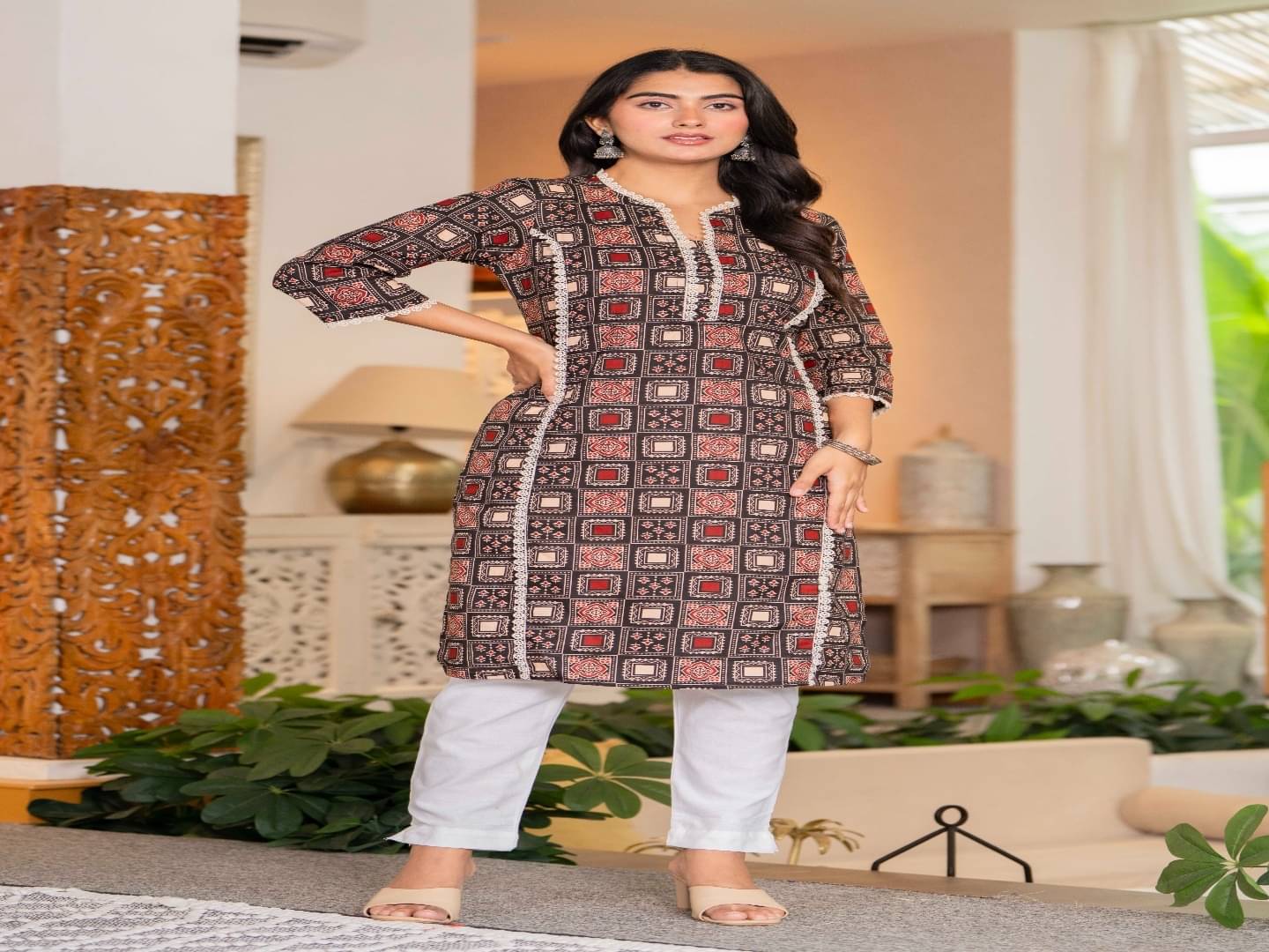     			Fasnesio Women Cotton Printed Straight Kurti ( Brown )