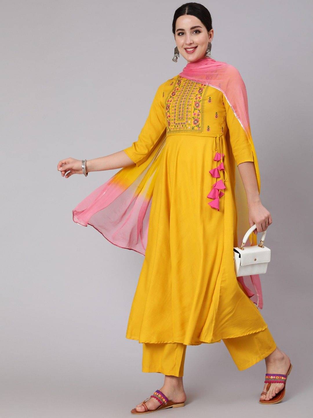     			Kimayra Women Viscose Embroidered Flared Kurti With Pants ( Yellow )