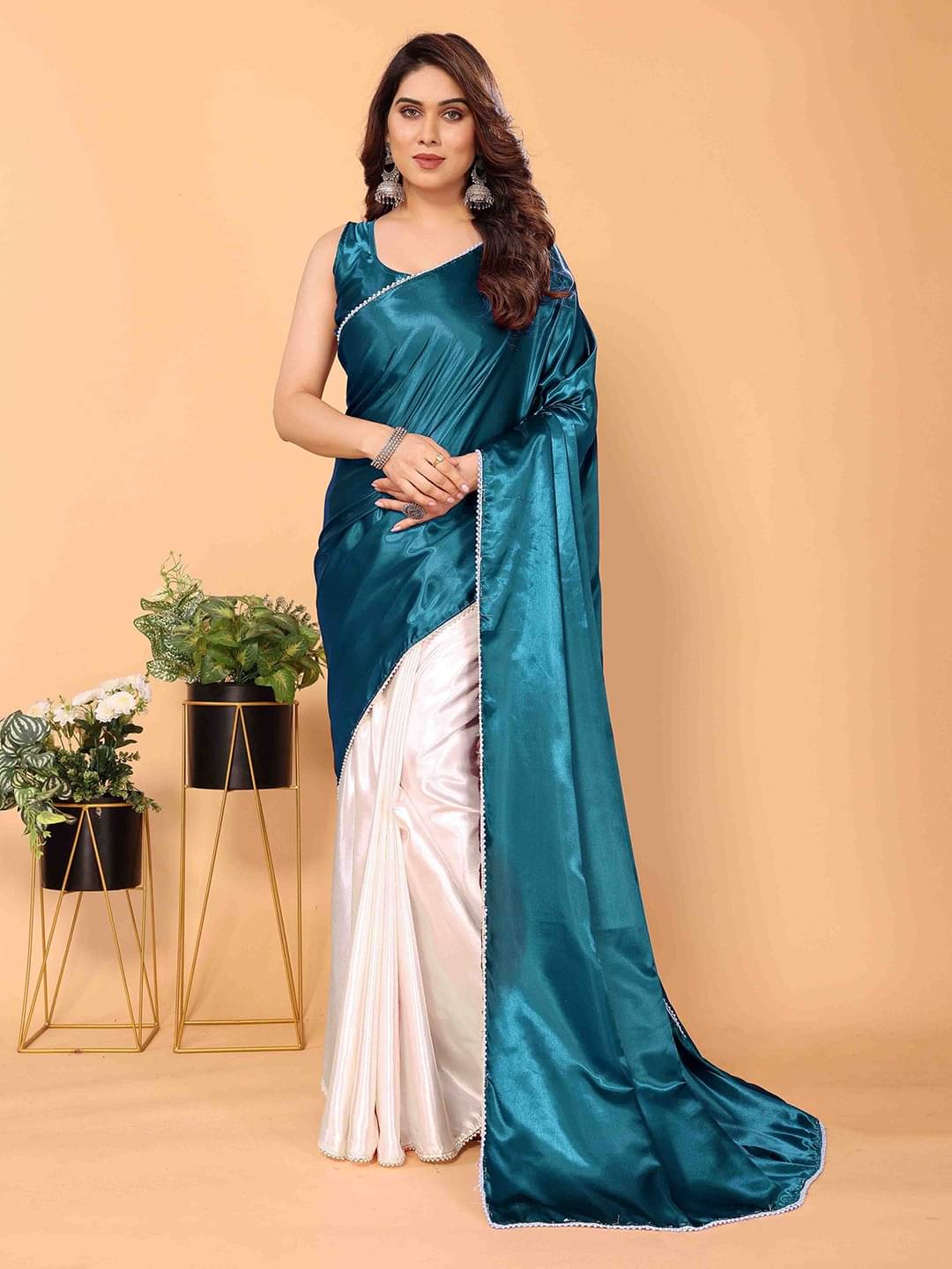     			SATVASHIV Satin Woven Regular Saree With Unstitched Blouse Piece ( Teal )