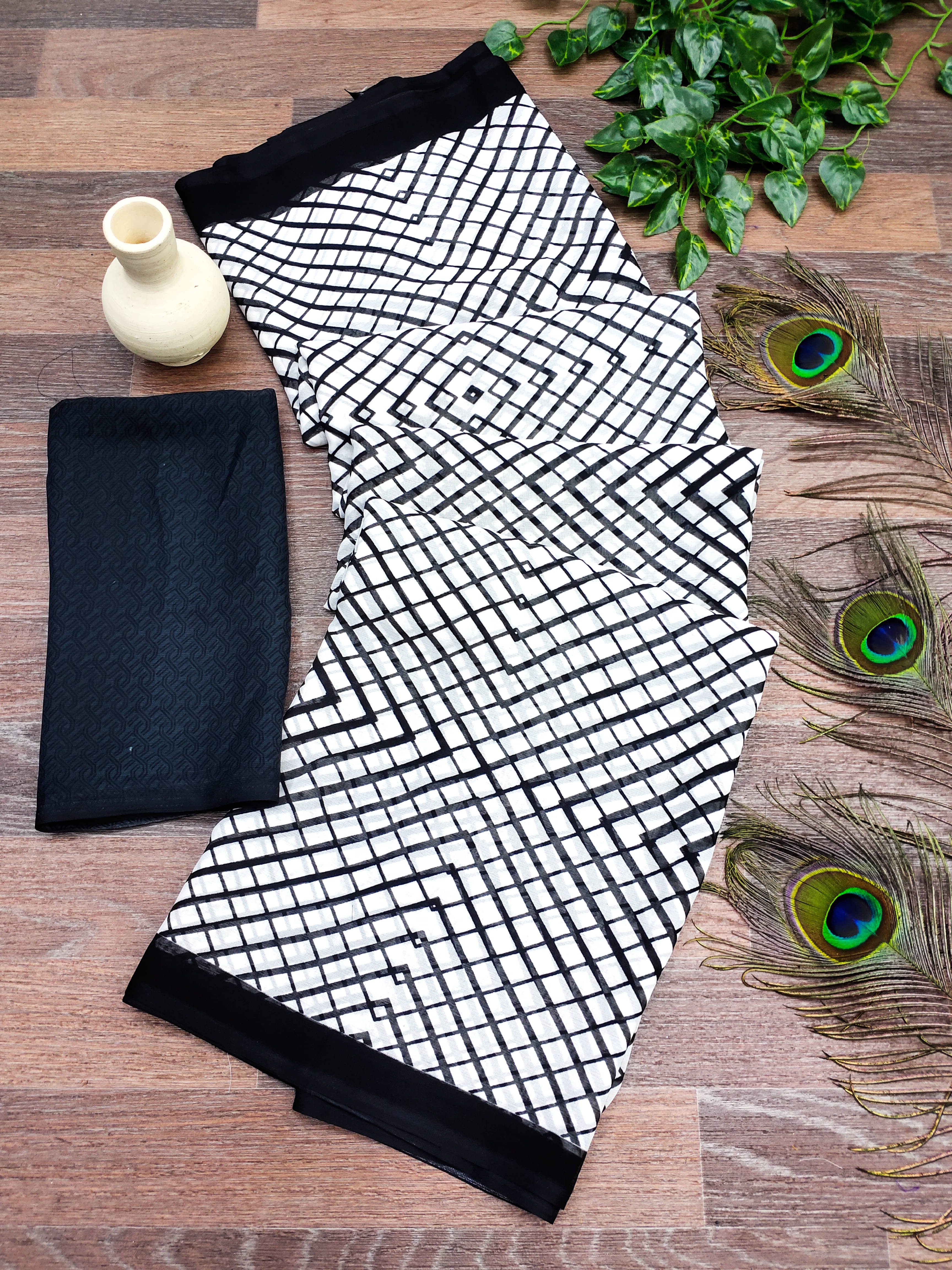 ANAND SAREES Georgette Printed Kasavu Saree With Unstitched Blouse Piece ( BLACK )     			ANAND SAREES Georgette Printed Kasavu Saree With Unstitched Blouse Piece ( BLACK )