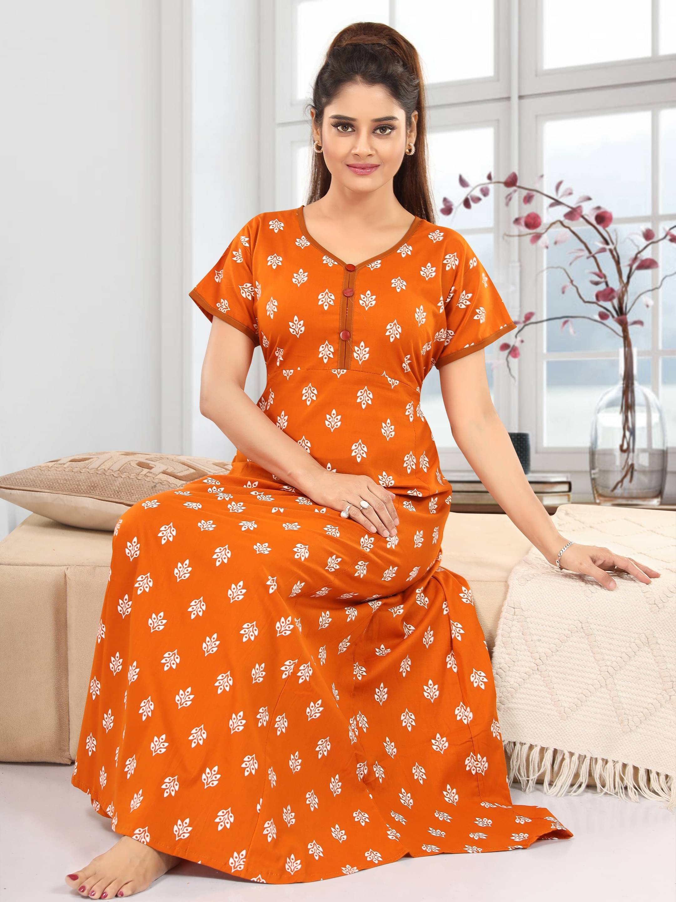     			Cinco Cotton Self Design Women Regular Nighty ( Orange )