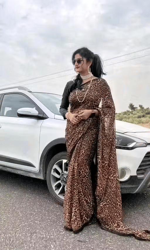     			GENERIC JAISHREE ENTERPRISE Georgette Printed Regular Saree With Unstitched Blouse Piece ( Black )