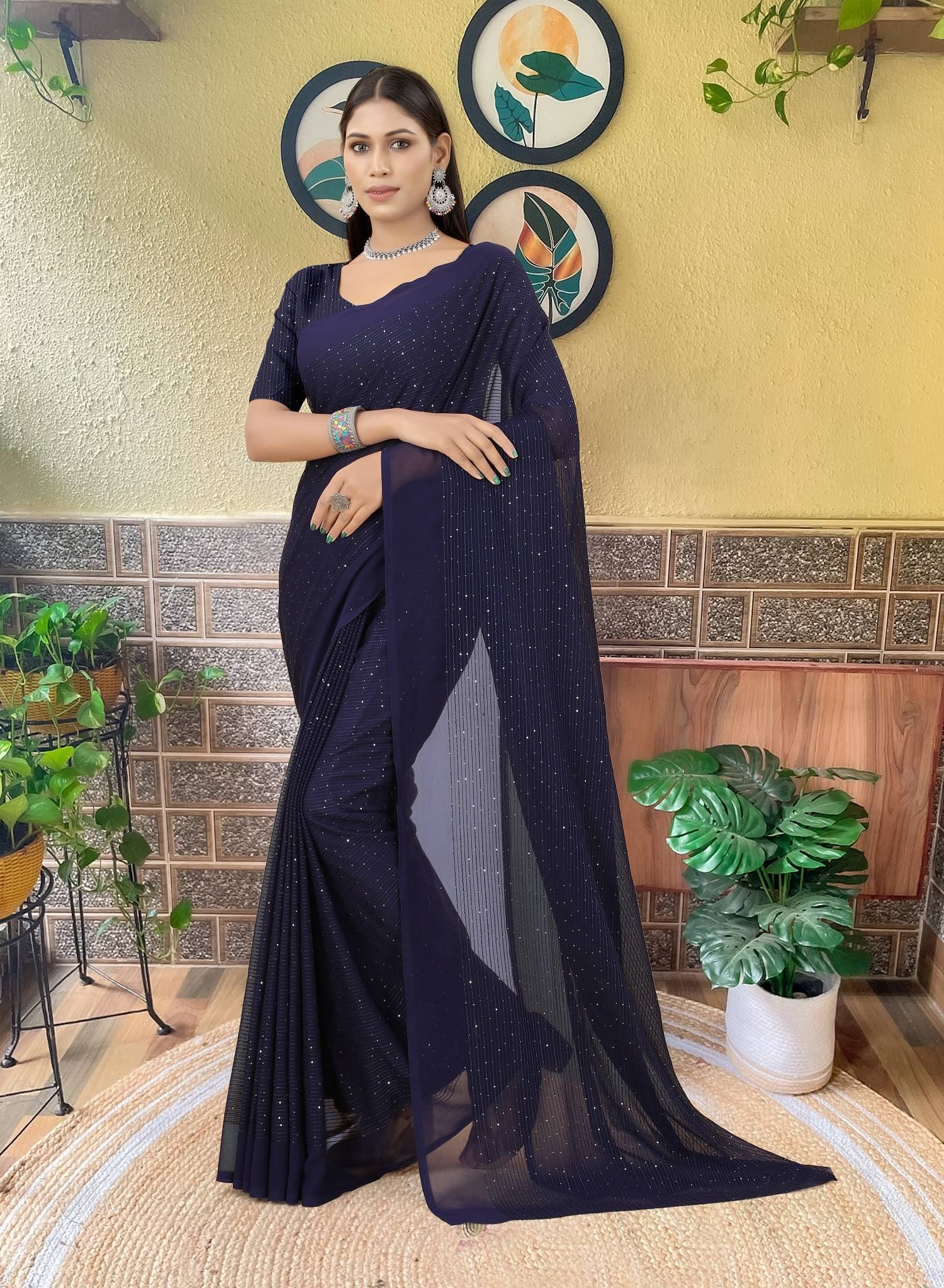     			Aika Georgette Embroidered Regular Saree With Unstitched Blouse Piece ( Navy Blue )