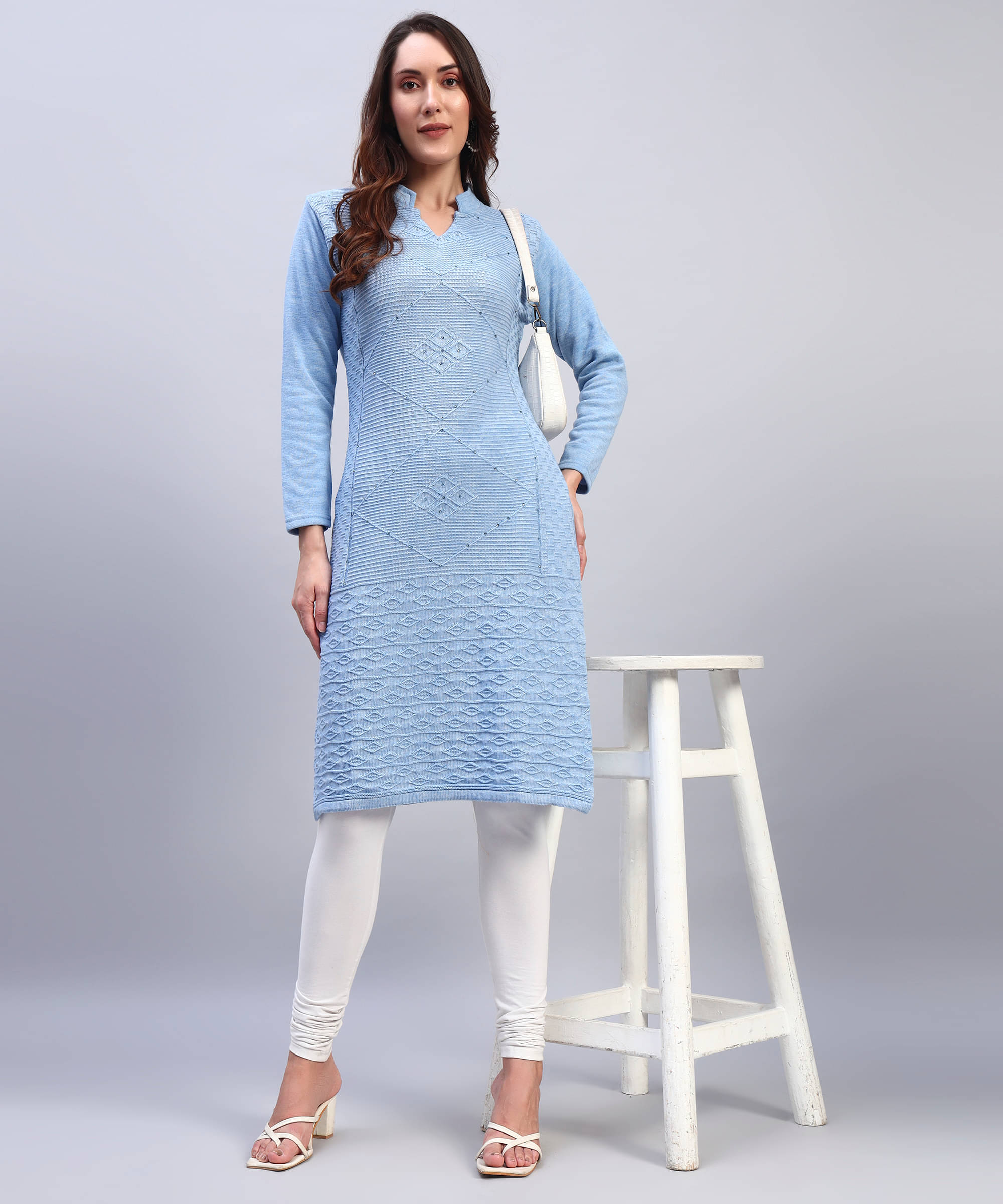 HEMLOCK Women Woollen Self Design Straight Kurti ( Light Blue ) HEMLOCK Women Woollen Self Design Straight Kurti ( Light Blue )