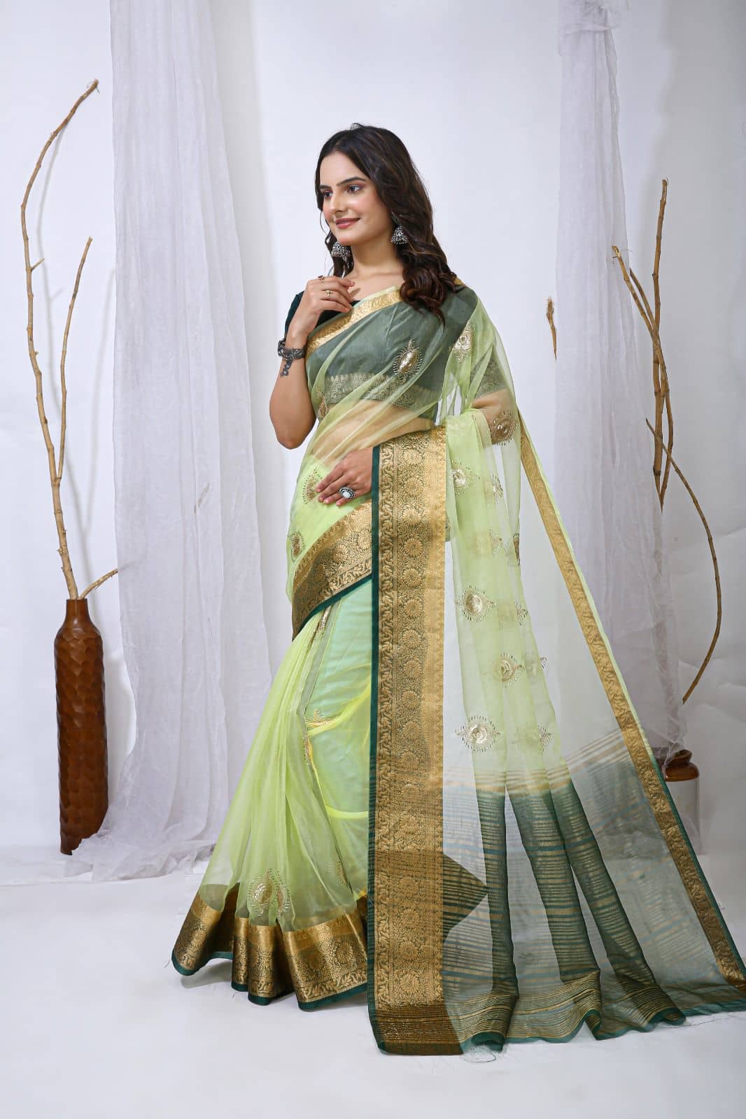 Rangtulika Ethnics Organza Solid Banarasi saree With Unstitched Blouse Piece ( Green ) - Sarees | Buy online on ZillyBuy