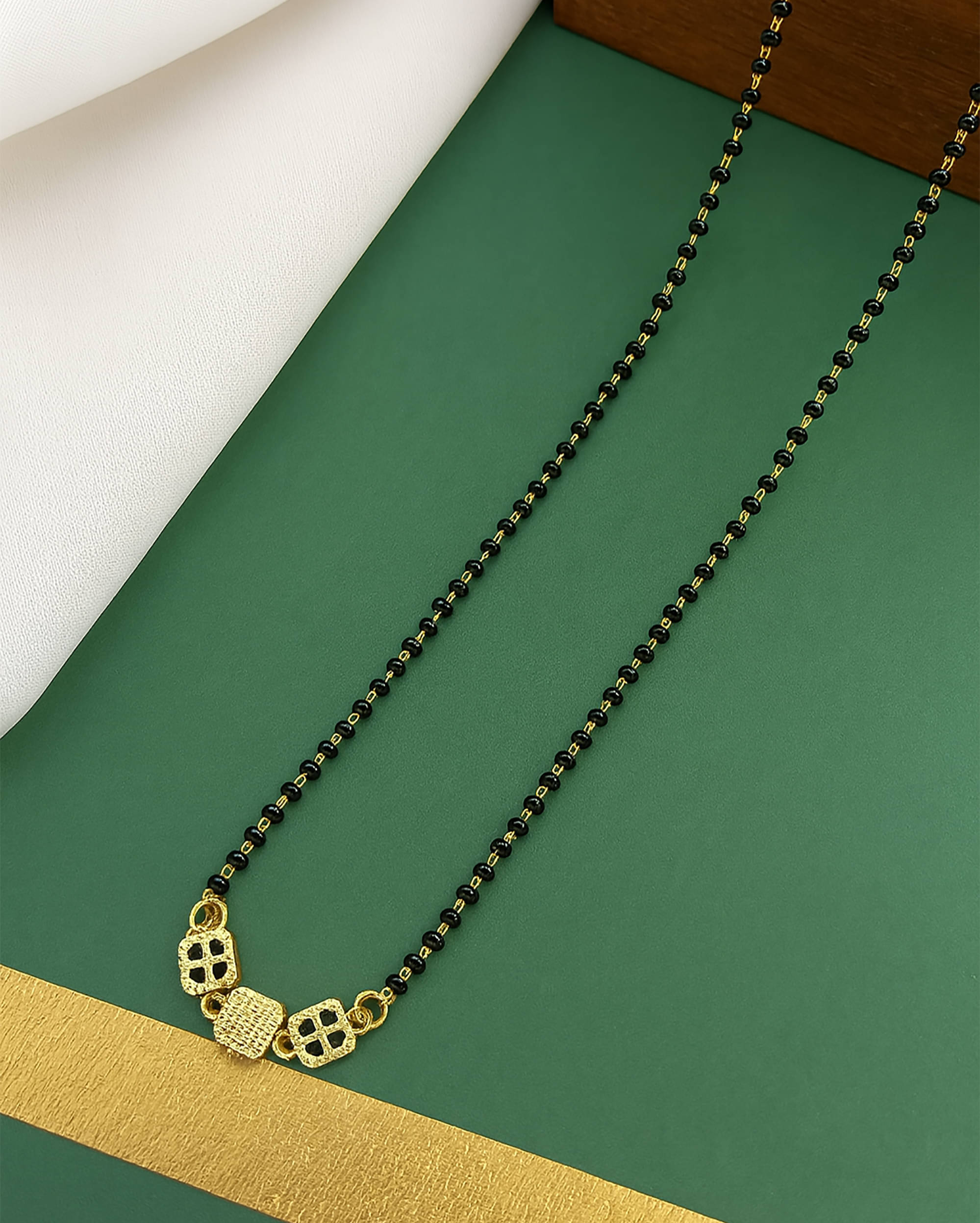 SHANKH-KRIVA Golden Mangalsutra ( Pack of 1 ) SHANKH-KRIVA Golden Mangalsutra ( Pack of 1 )