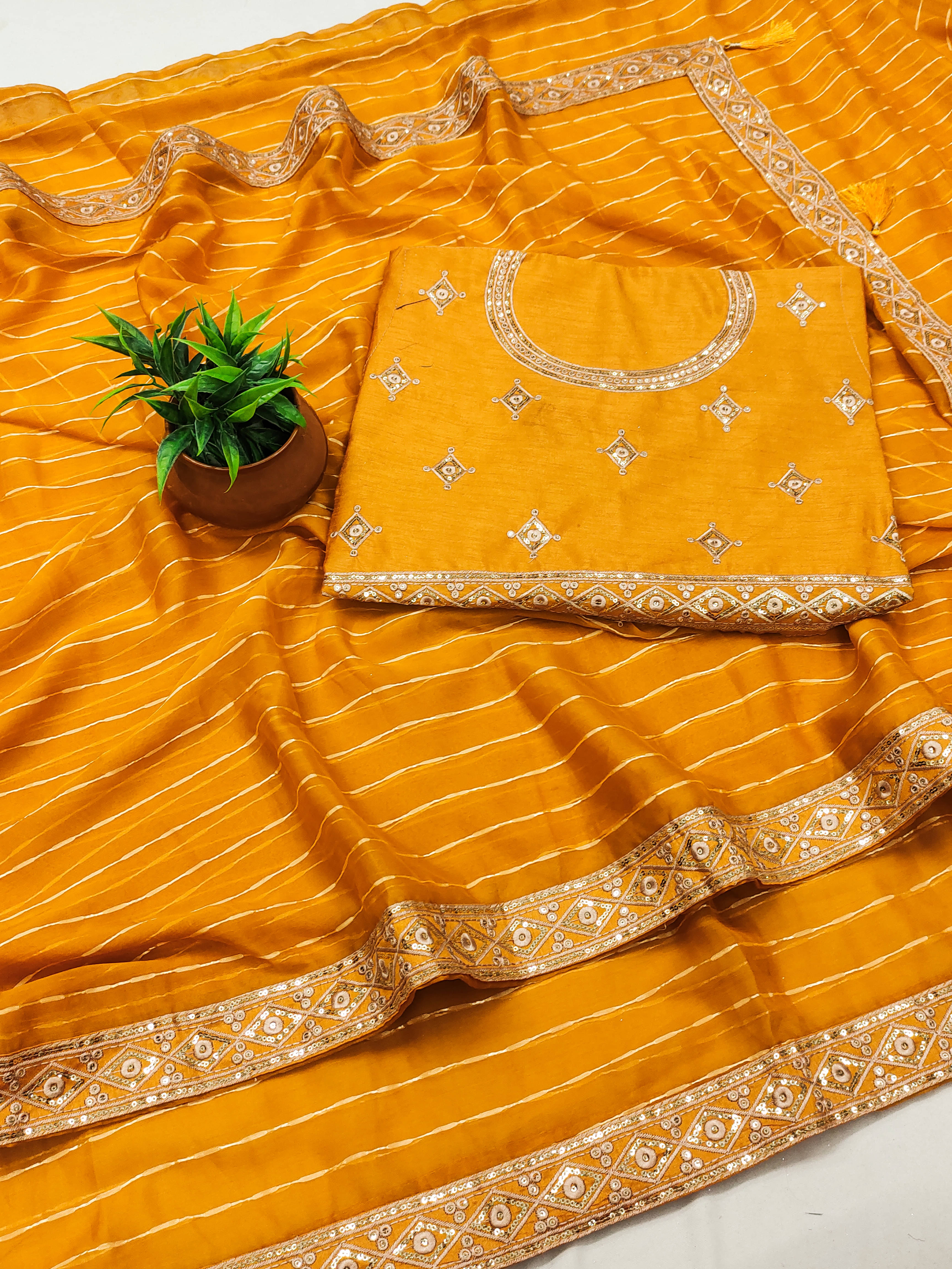     			VEDANT VASTRAM Georgette Embroidered Regular Saree With Unstitched Blouse Piece ( Mustard )