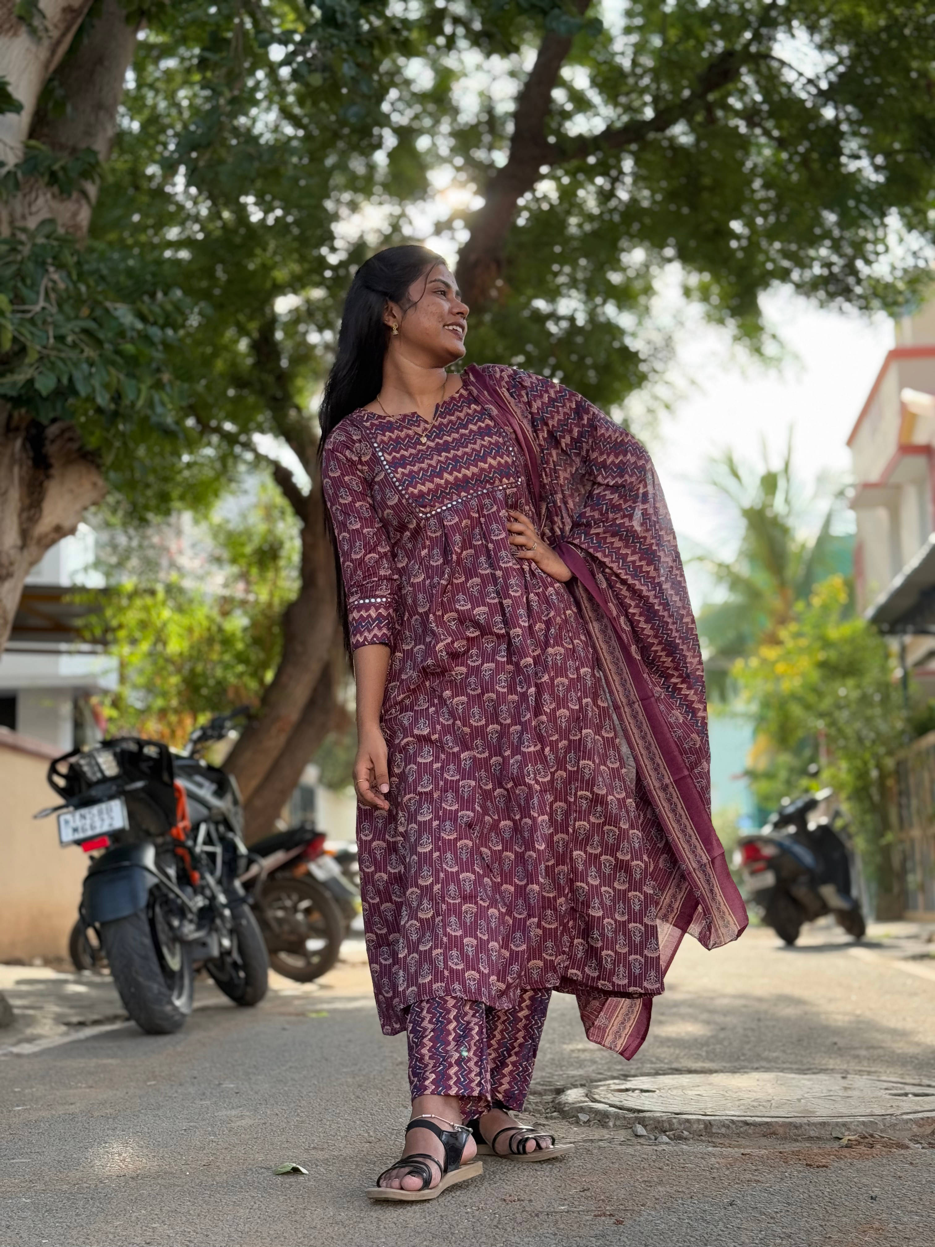 ROLYPOLY Women Cotton Blend Printed A-line Kurti With Pants ( Wine )     			ROLYPOLY Women Cotton Blend Printed A-line Kurti With Pants ( Wine )