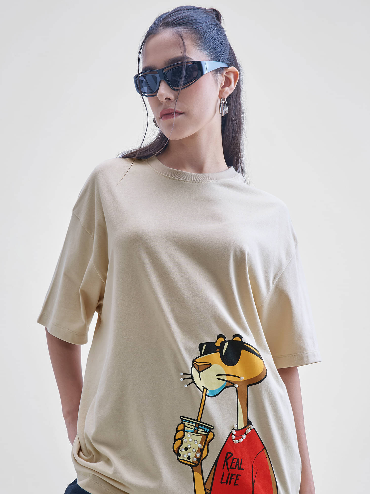     			Tokyo Talkies Women Cotton Blend Oversized Fit Round Neck T-Shirt ( Beige )