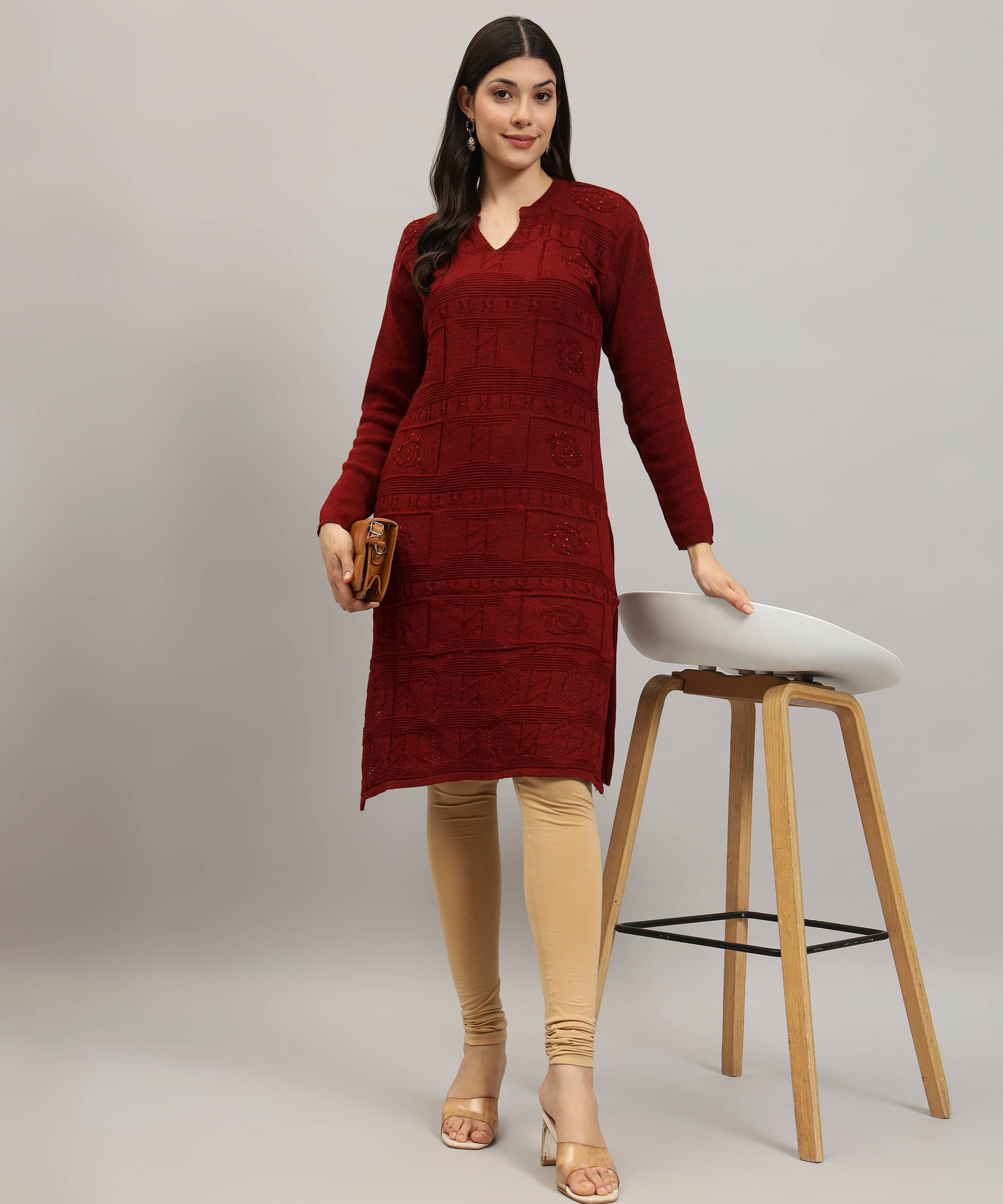     			Canblar Women Woollen Solid Straight Kurti ( Maroon )