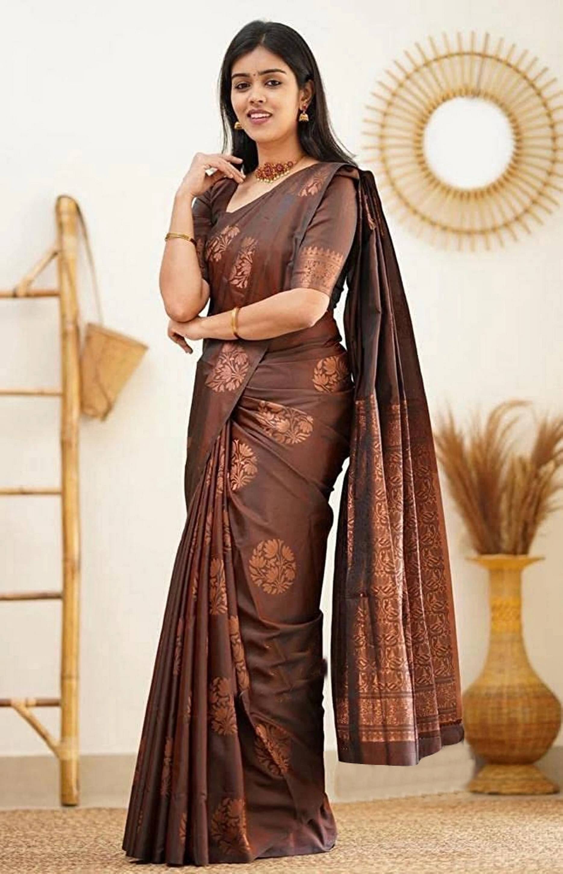 Yashika Cotton Silk Printed Kanjeevaram Sarees With Unstitched Blouse Piece ( Brown )     			Yashika Cotton Silk Printed Kanjeevaram Sarees With Unstitched Blouse Piece ( Brown )