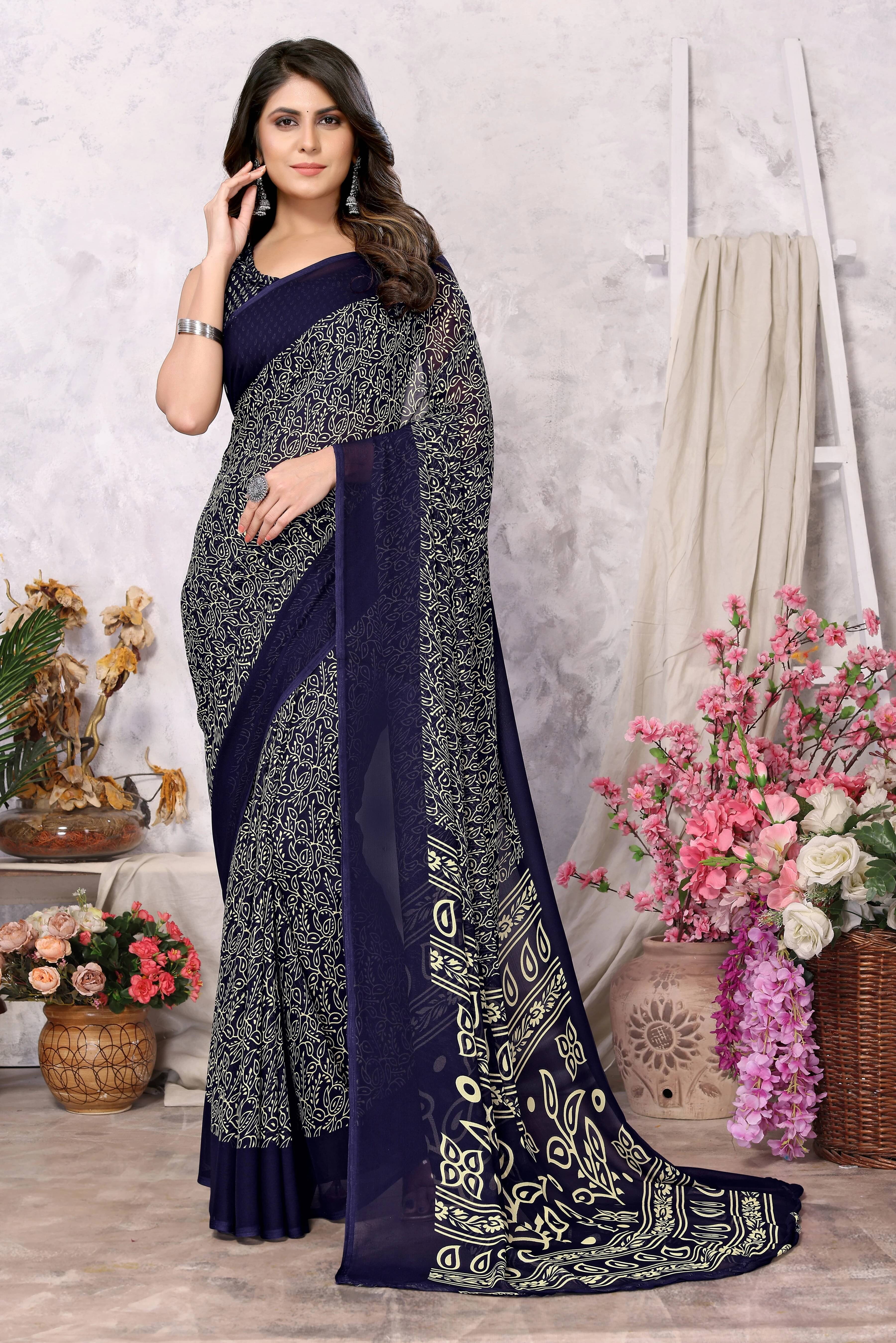 Yashika Georgette Dyed Regular Saree With Unstitched Blouse Piece ( Navy Blue ) Yashika Georgette Dyed Regular Saree With Unstitched Blouse Piece ( Navy Blue )