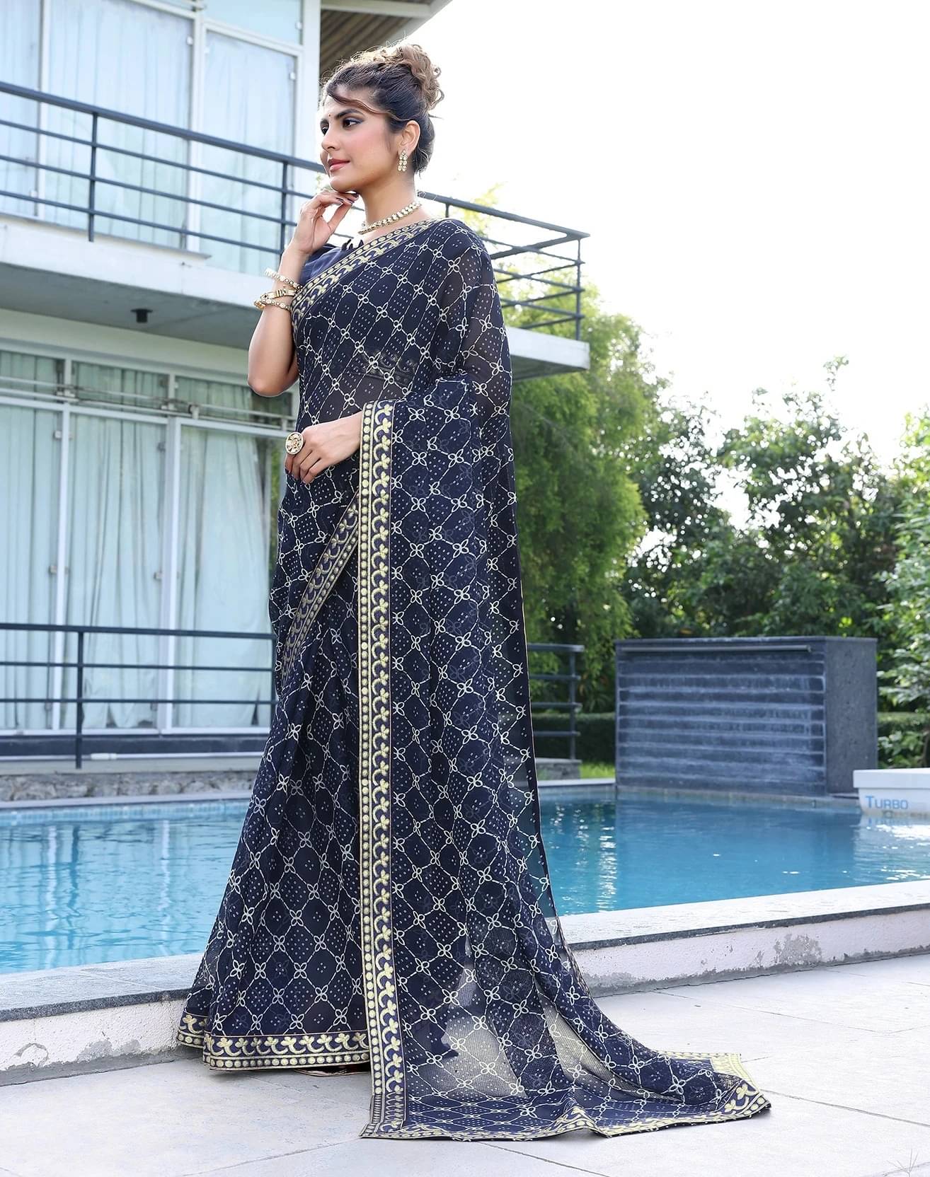 Yashika Georgette Printed Bandhani Sarees With Unstitched Blouse Piece ( Navy Blue ) Yashika Georgette Printed Bandhani Sarees With Unstitched Blouse Piece ( Navy Blue )