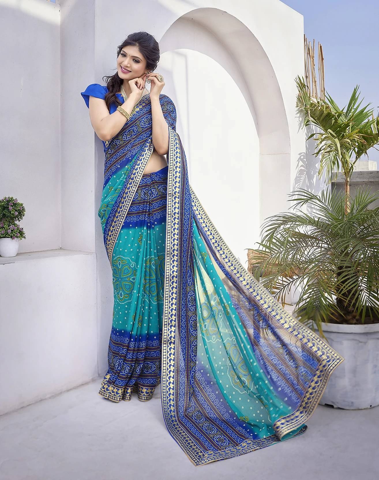 Yashika Georgette Printed Regular Saree With Unstitched Blouse Piece ( Blue )     			Yashika Georgette Printed Regular Saree With Unstitched Blouse Piece ( Blue )