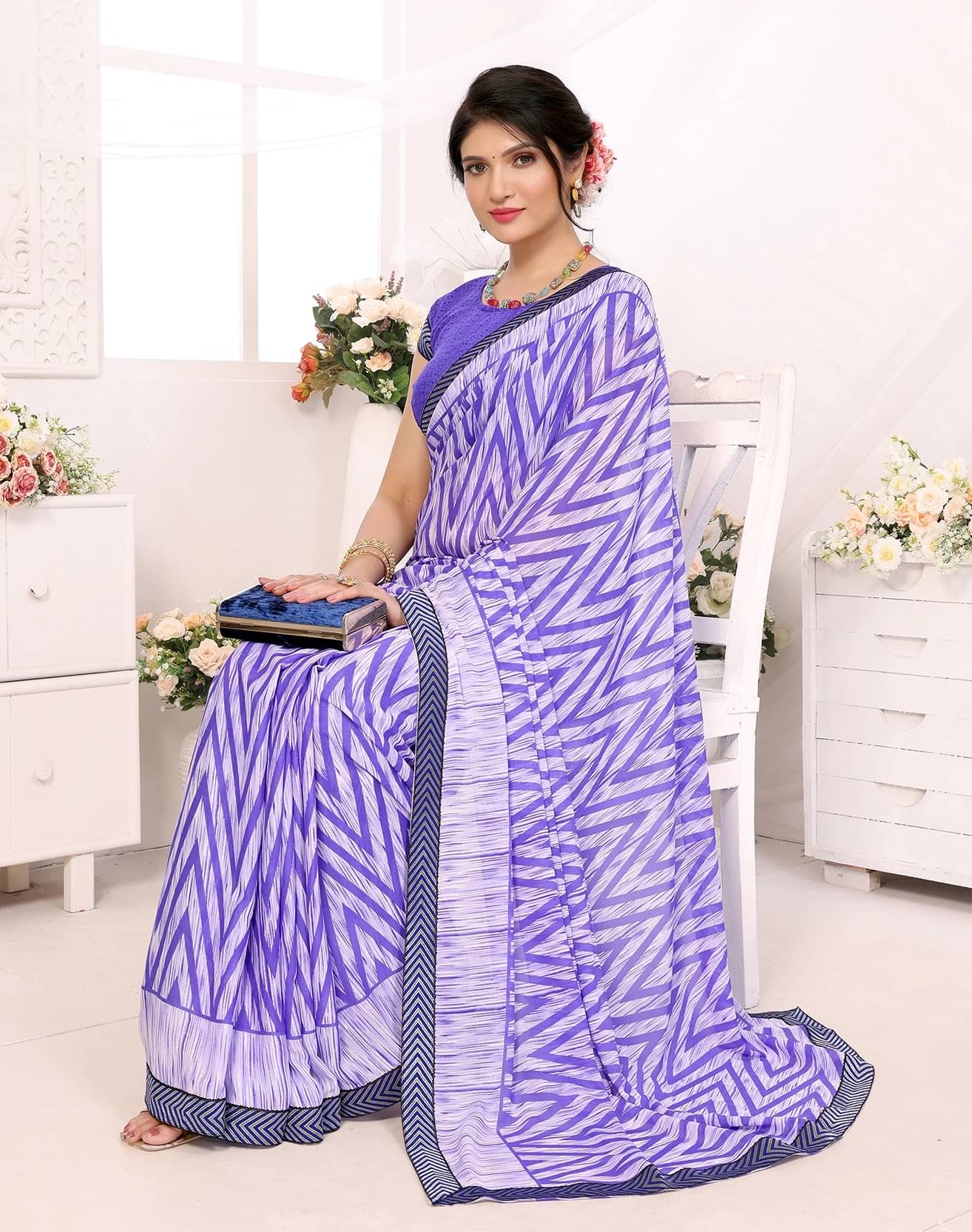 Yashika Georgette Printed Regular Saree With Unstitched Blouse Piece ( Purple ) Yashika Georgette Printed Regular Saree With Unstitched Blouse Piece ( Purple )
