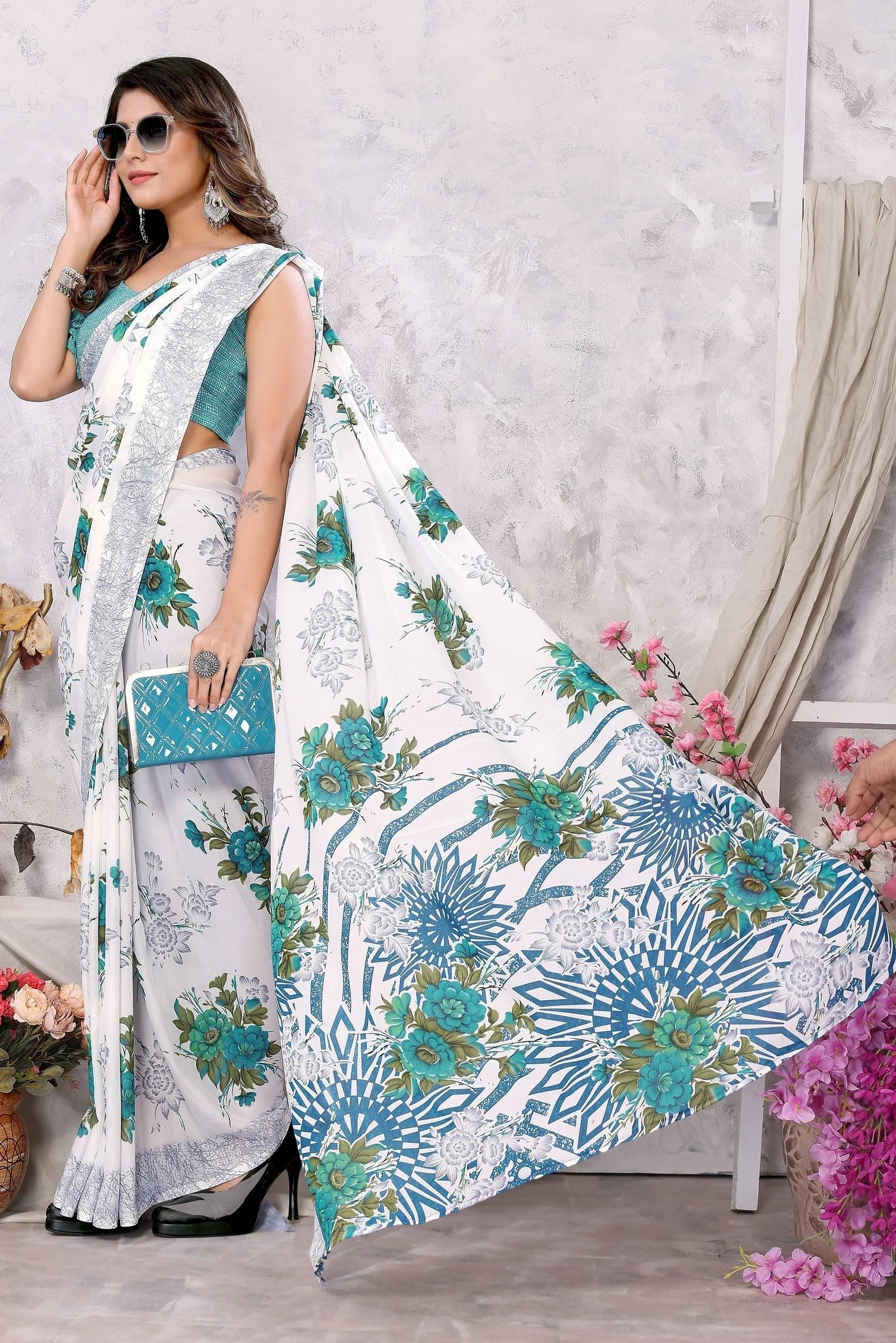 Yashika Georgette Printed Regular Saree With Unstitched Blouse Piece ( Blue )     			Yashika Georgette Printed Regular Saree With Unstitched Blouse Piece ( Blue )