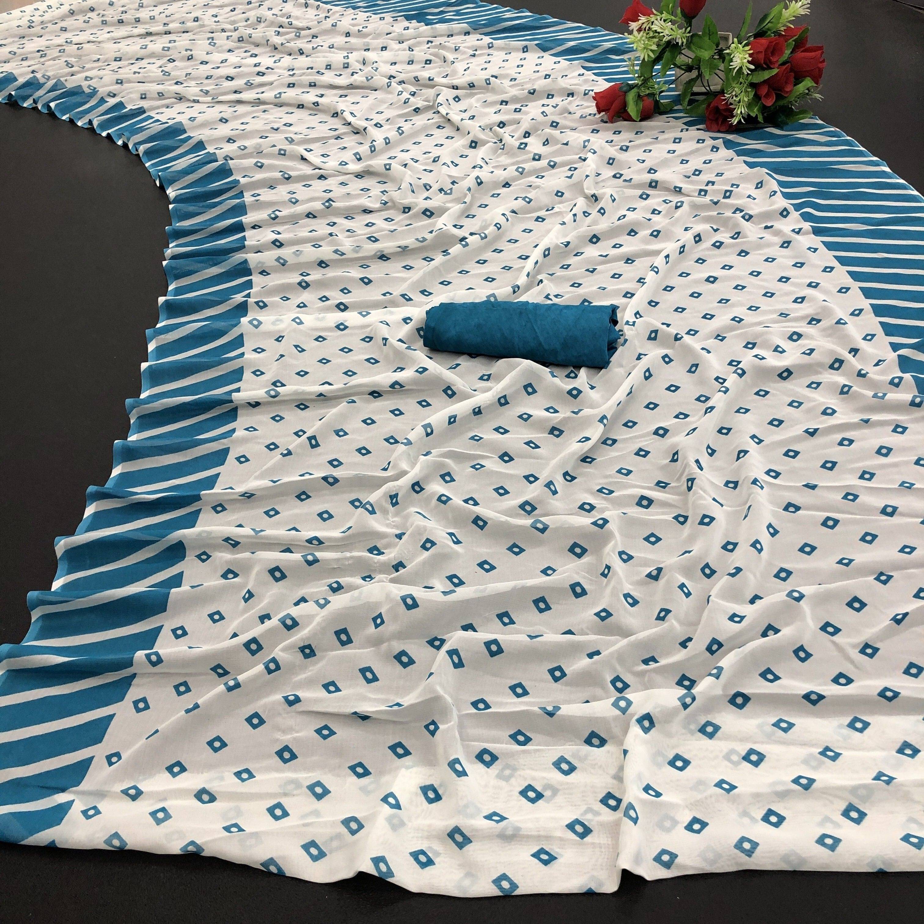Yashika Georgette Printed Regular Saree With Unstitched Blouse Piece ( Light Blue ) Yashika Georgette Printed Regular Saree With Unstitched Blouse Piece ( Light Blue )
