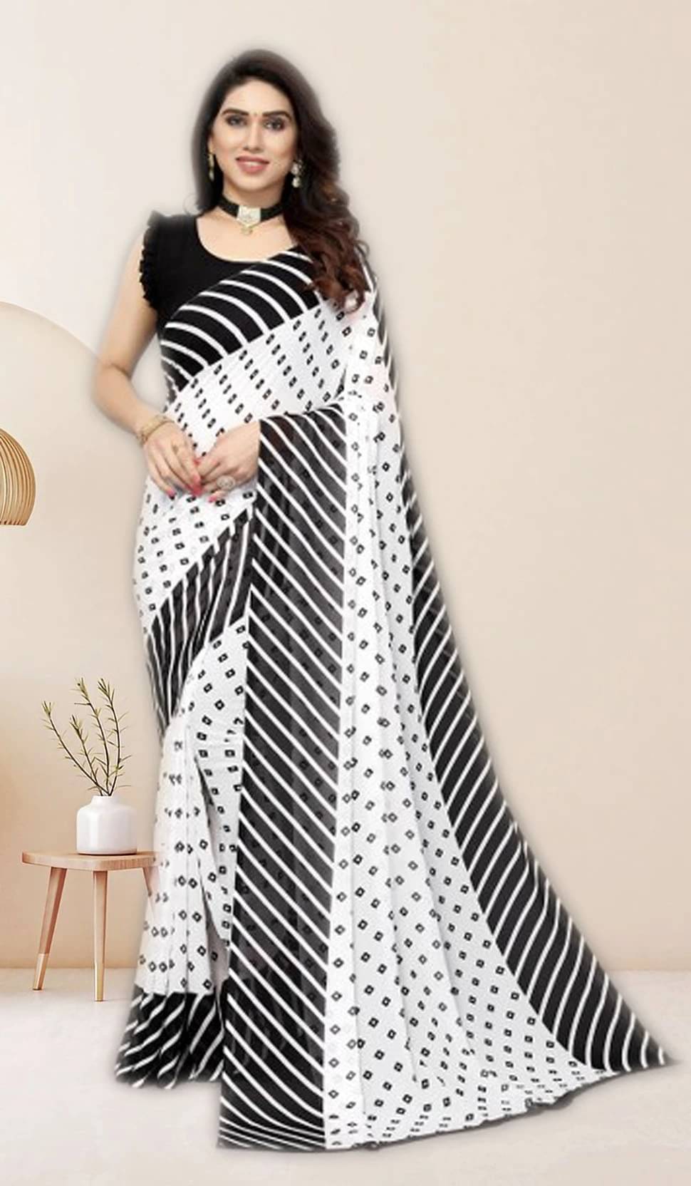     			Yashika Georgette Printed Regular Saree With Unstitched Blouse Piece ( Black )