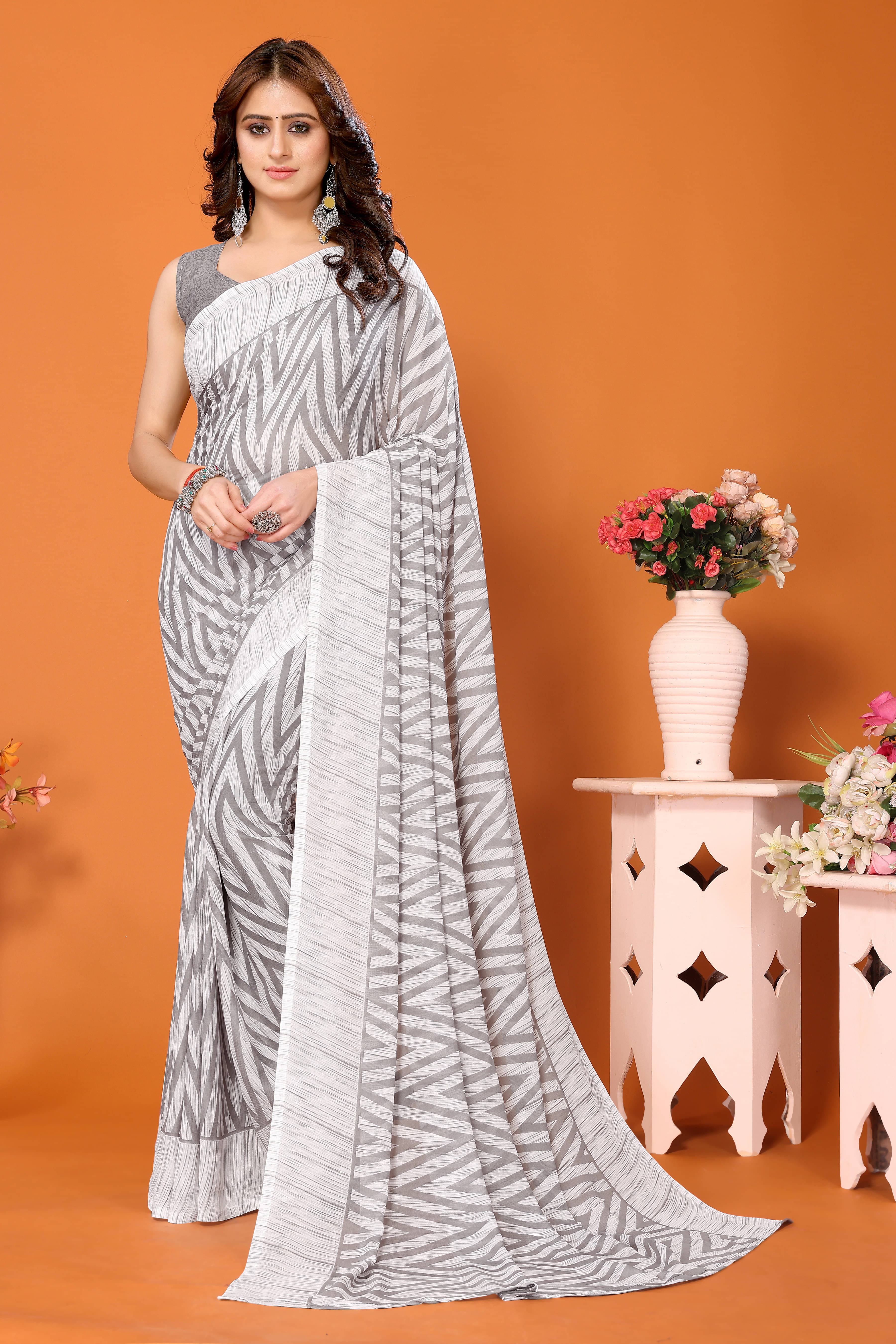     			Yashika Georgette Printed Regular Saree With Unstitched Blouse Piece ( Grey )