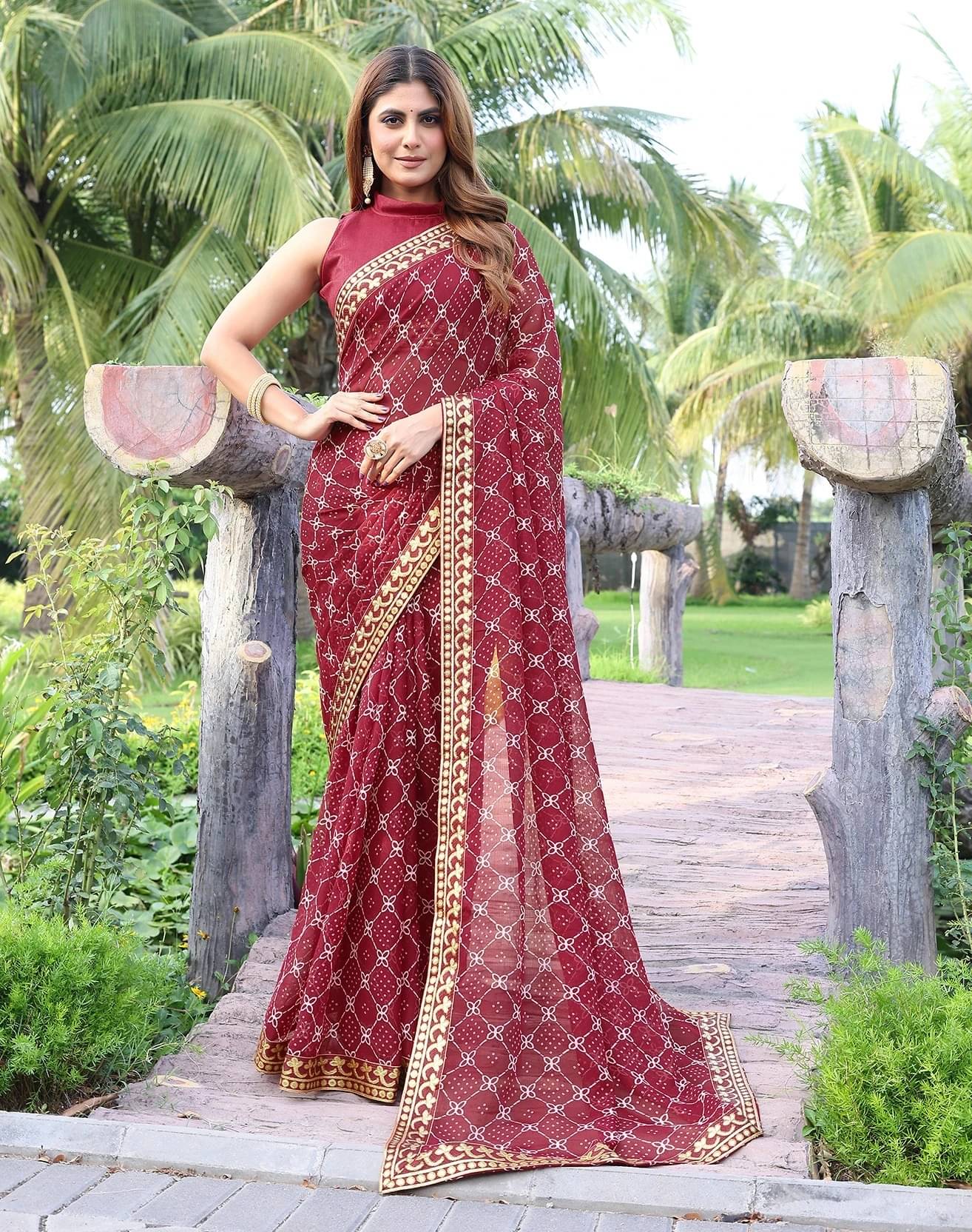     			Yashika Georgette Printed Regular Saree With Unstitched Blouse Piece ( Maroon )