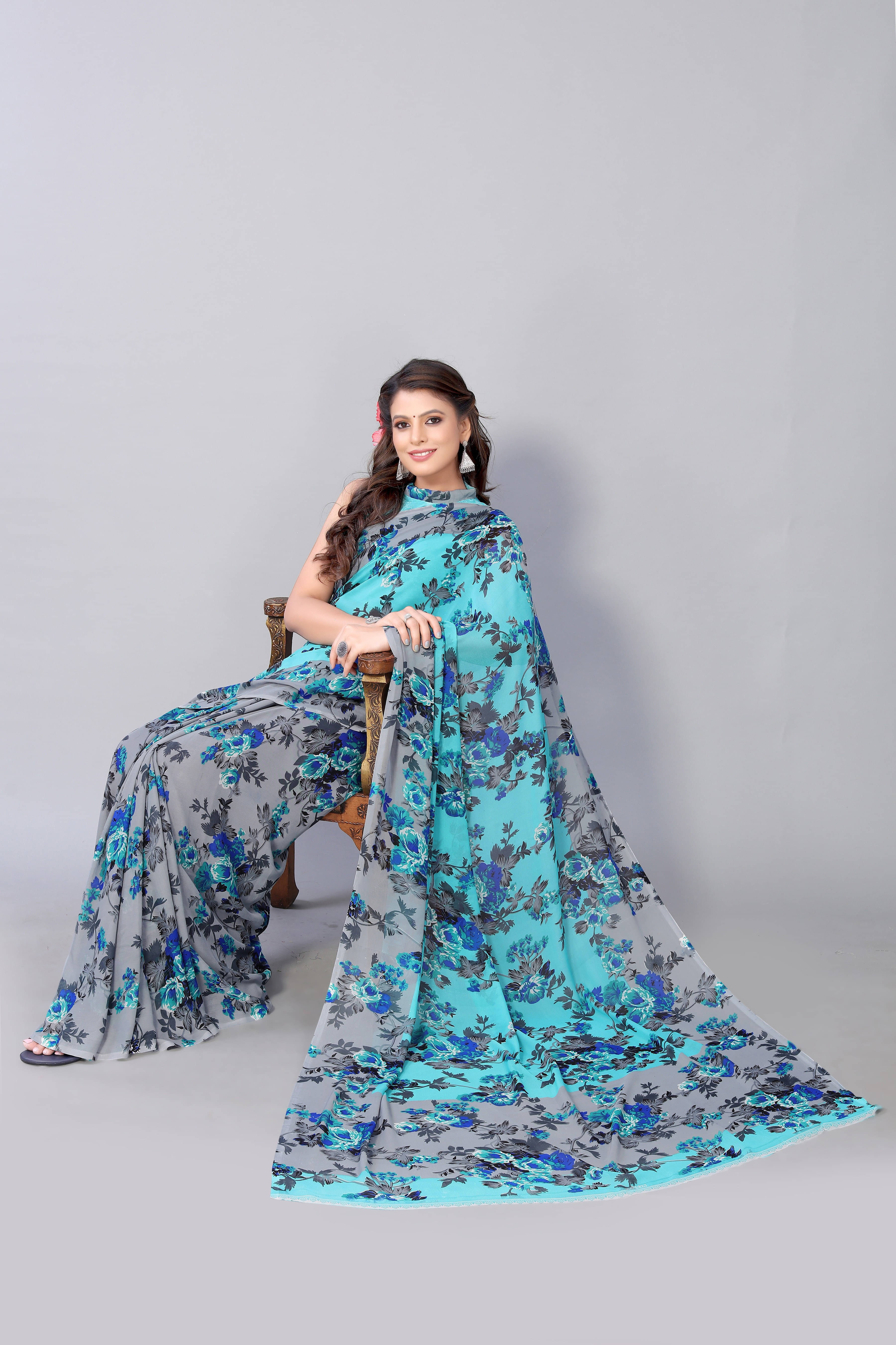 Yashika Georgette Printed Regular Saree With Unstitched Blouse Piece ( Light Blue )     			Yashika Georgette Printed Regular Saree With Unstitched Blouse Piece ( Light Blue )