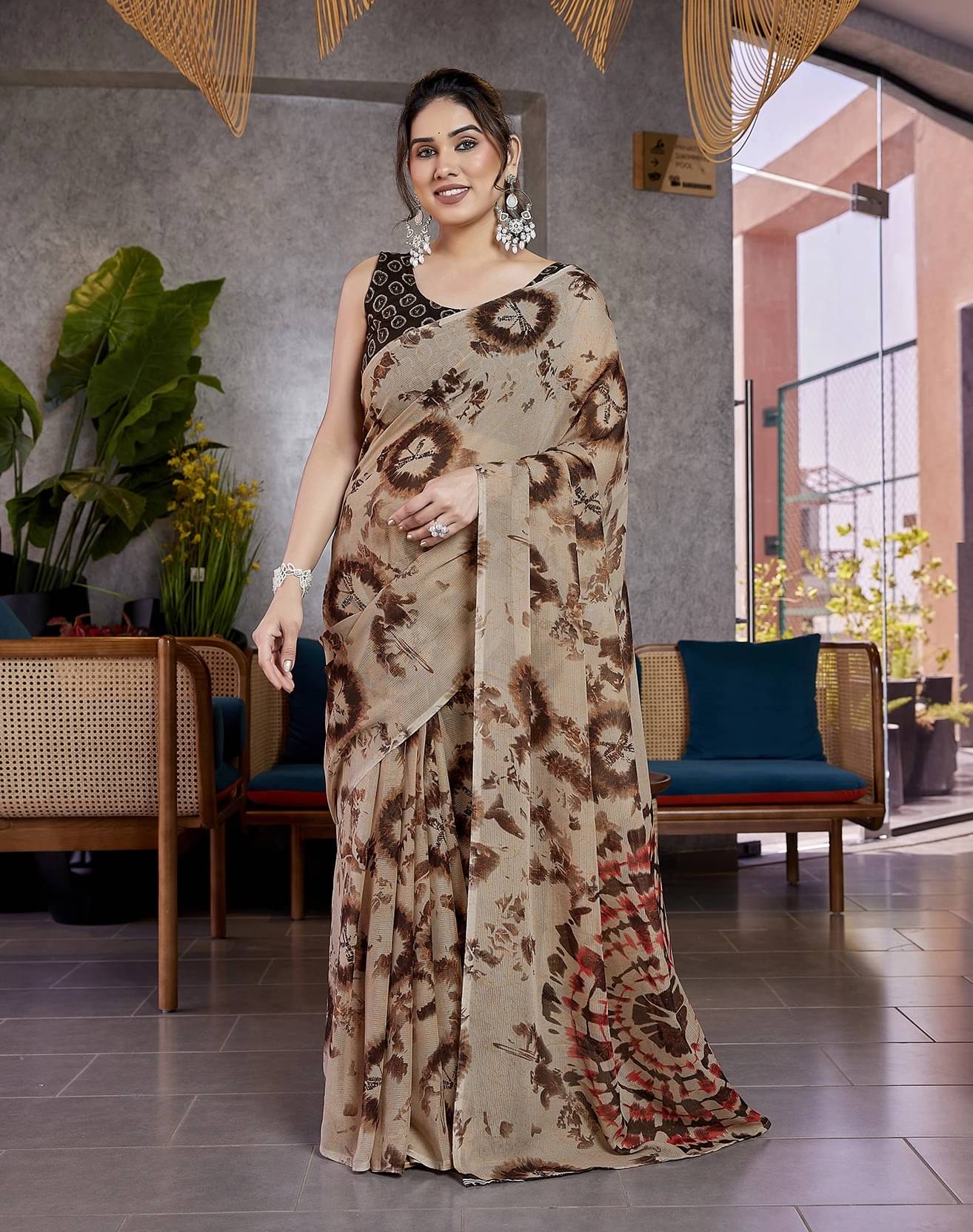     			Yashika Georgette Printed Regular Saree With Unstitched Blouse Piece ( Brown )