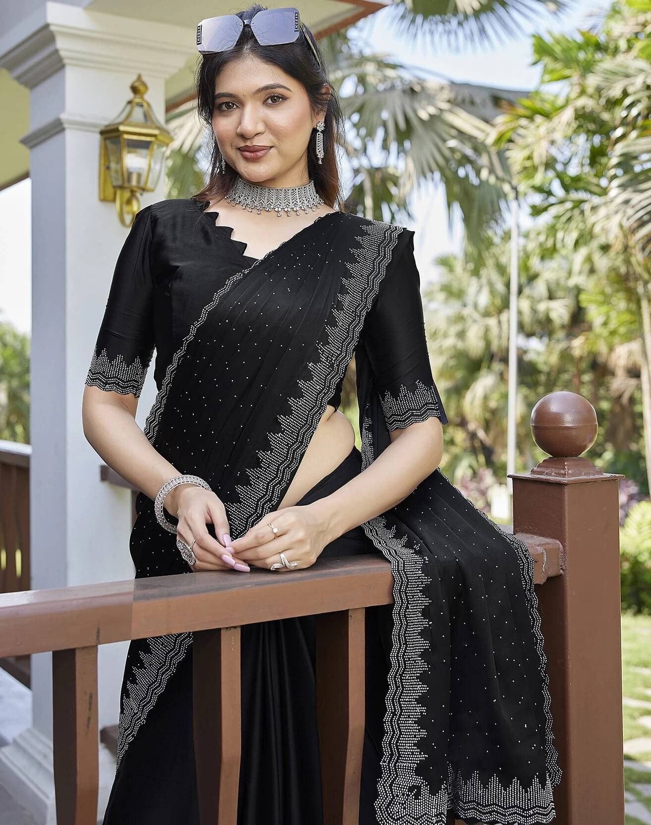Yashika Jimmy choo Embellished Regular Saree With Unstitched Blouse Piece ( Black ) Yashika Jimmy choo Embellished Regular Saree With Unstitched Blouse Piece ( Black )