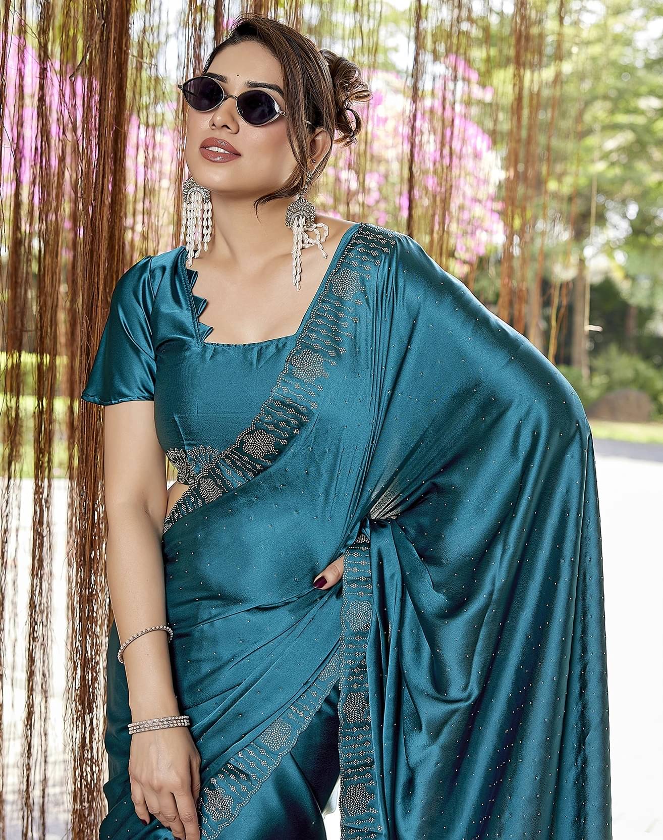     			Yashika Satin Embellished Regular Saree With Unstitched Blouse Piece ( Blue )
