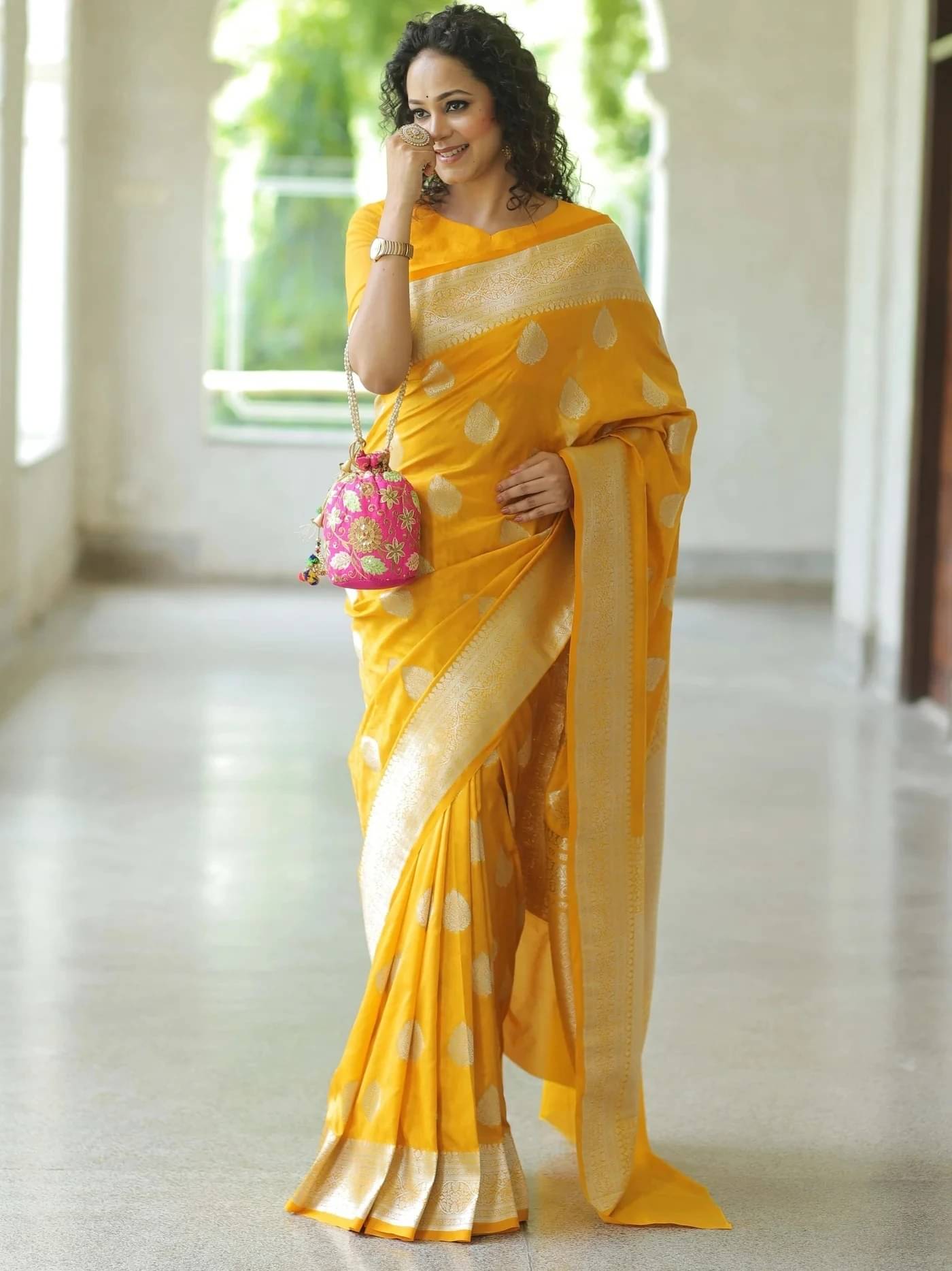 Yashika Silk Blend Self Design Kanjeevaram Sarees With Unstitched Blouse Piece ( Yellow ) Yashika Silk Blend Self Design Kanjeevaram Sarees With Unstitched Blouse Piece ( Yellow )