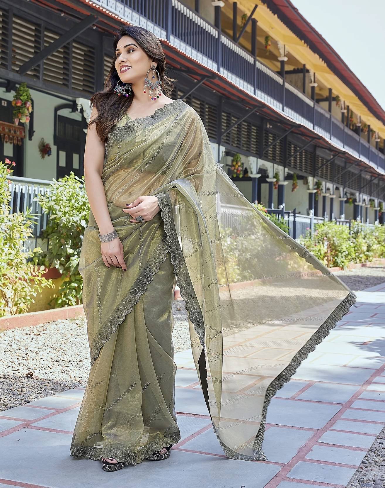 Yashika Tissue Embellished Regular Saree With Unstitched Blouse Piece ( Green ) Yashika Tissue Embellished Regular Saree With Unstitched Blouse Piece ( Green )