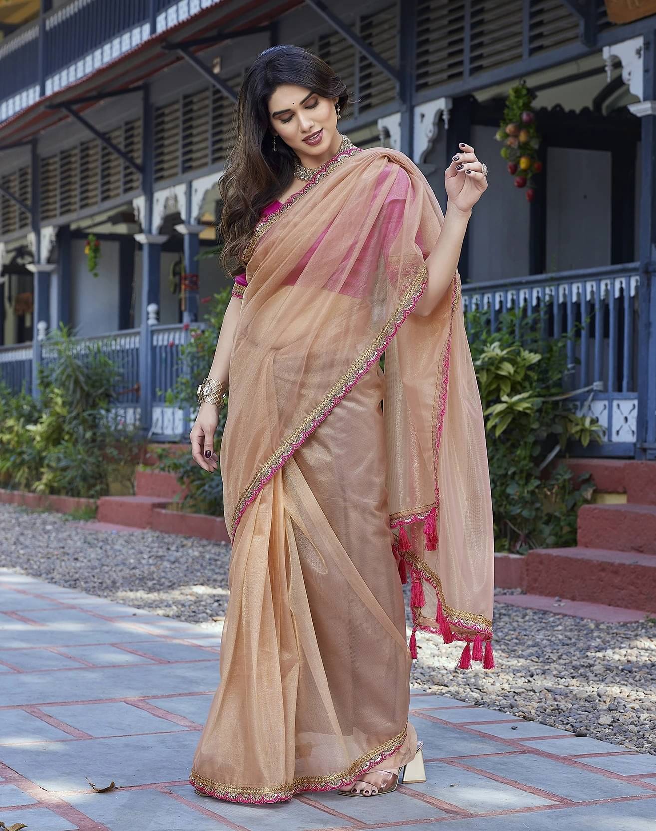     			Yashika Tissue Embellished Regular Saree With Unstitched Blouse Piece ( Gold )